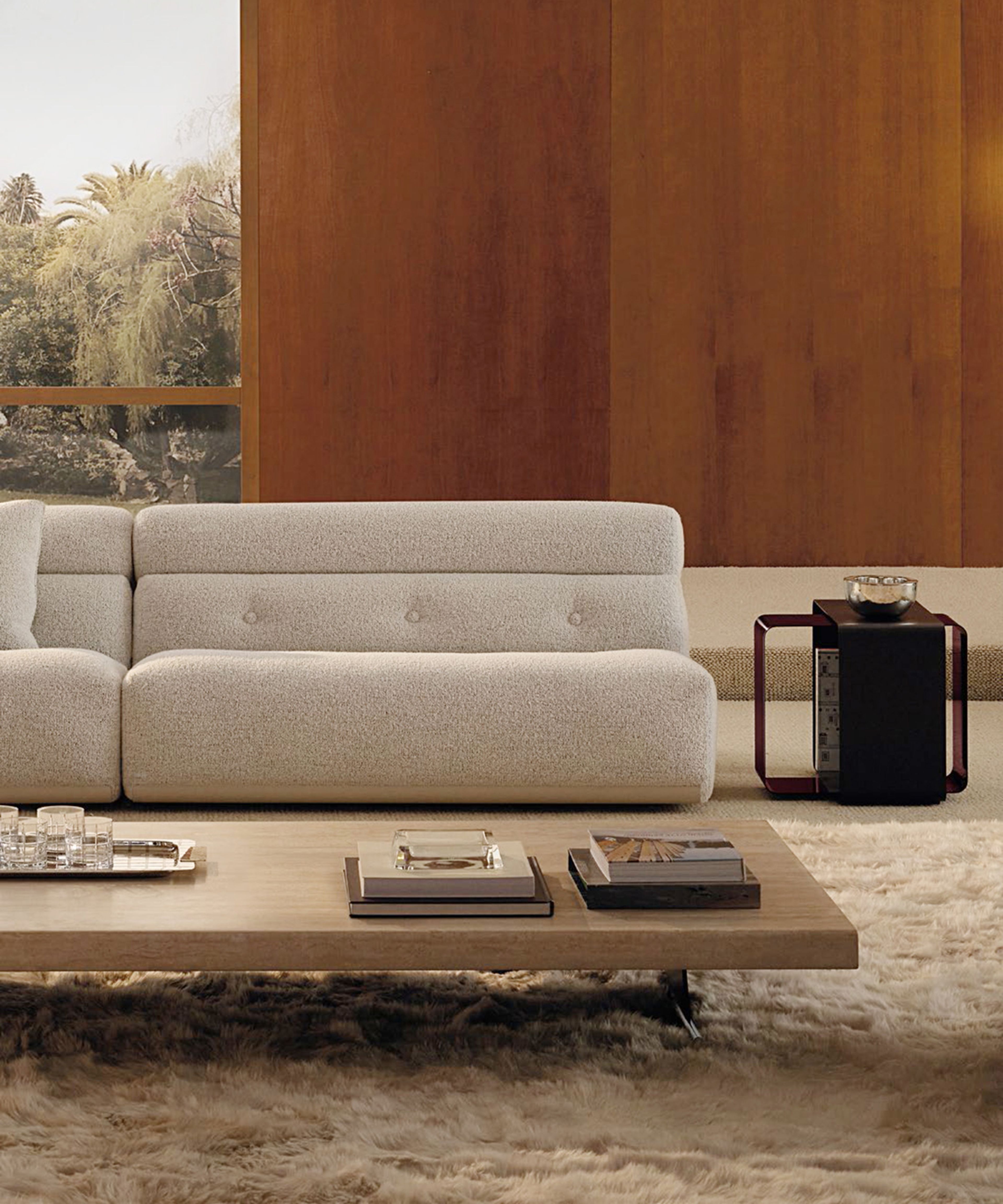 A seating system with overlapping rounded volumes by Minotti.