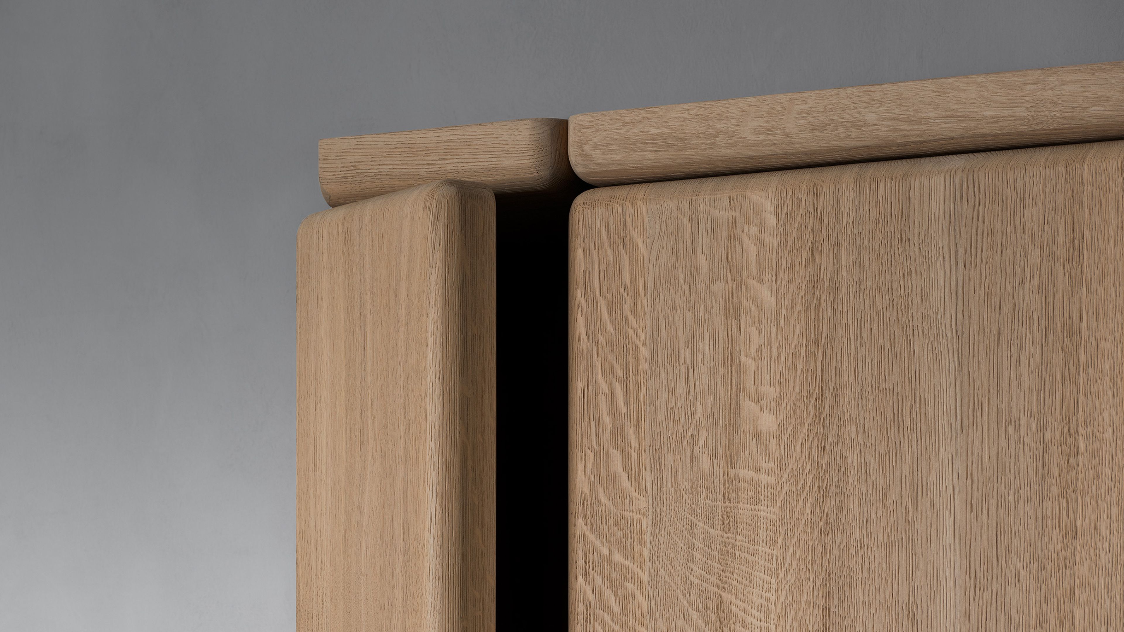A tall, sleek storage cabinet by Van Rossum.