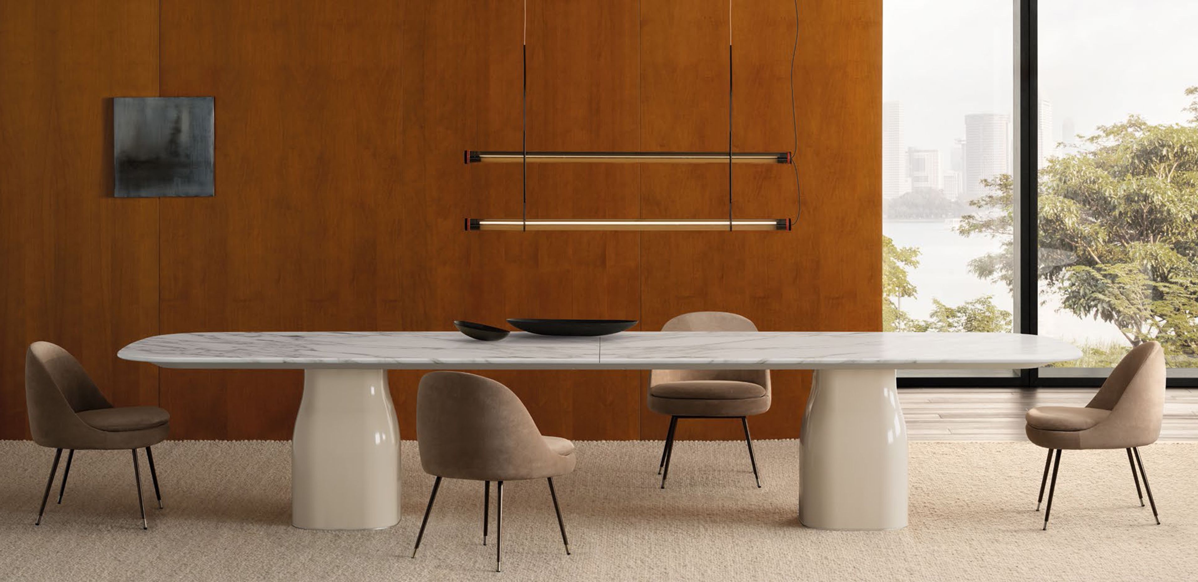 A sleek dining little armchair by Minotti.