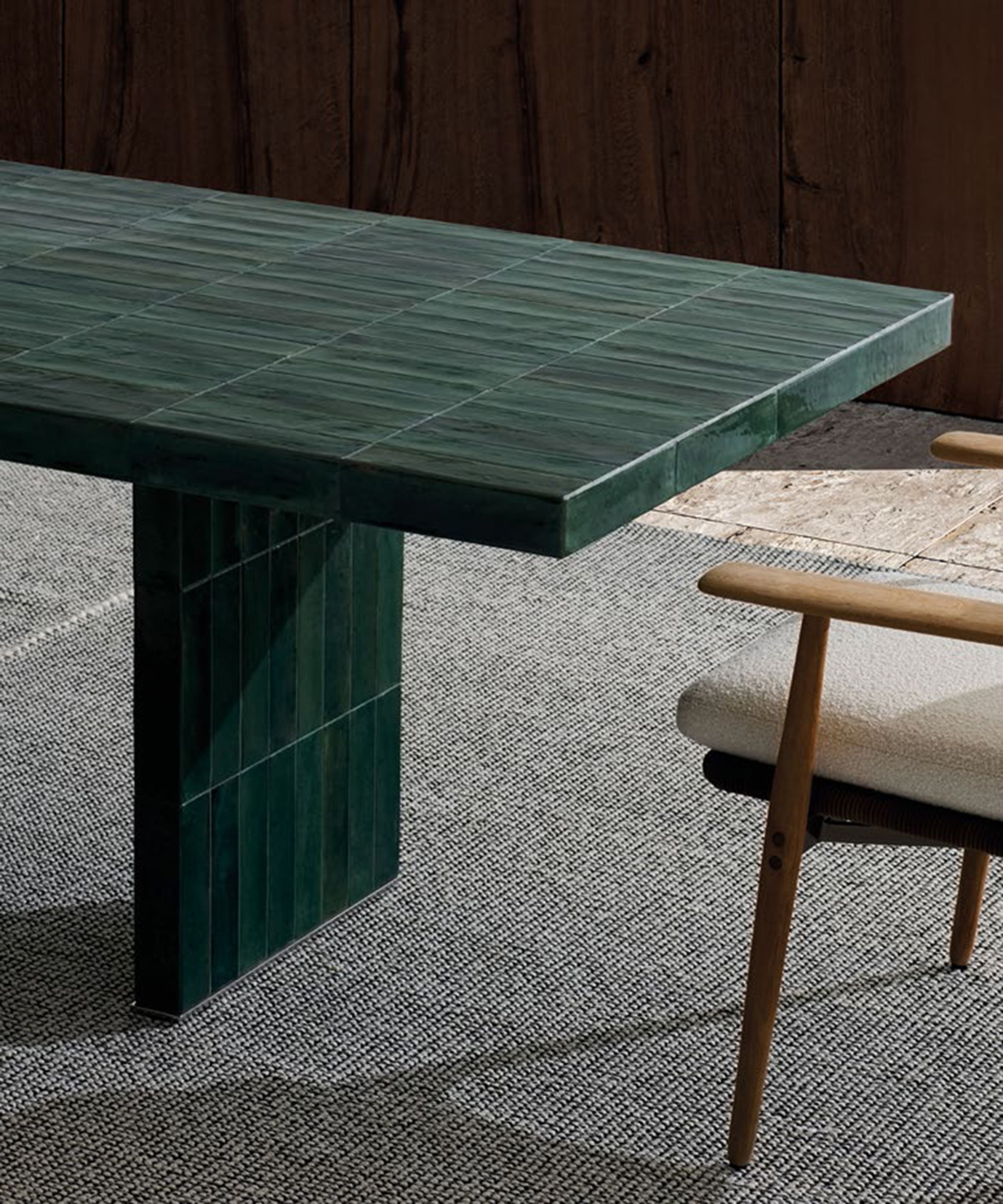 The Andrée Dining Outdoor table by Minotti pairs clear geometry with a subtly textured surface.