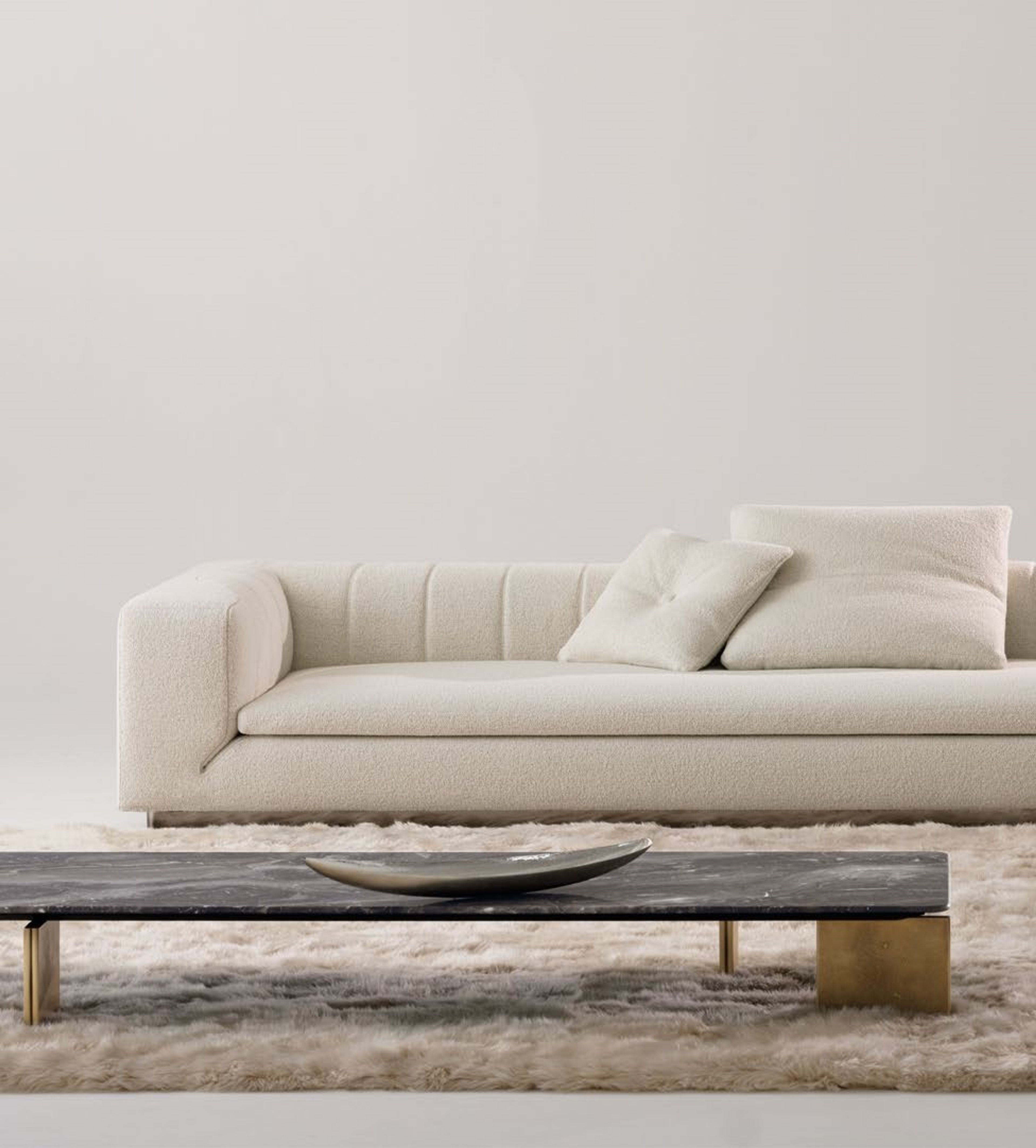 Minotti coffee table with sculpted double-curved legs.