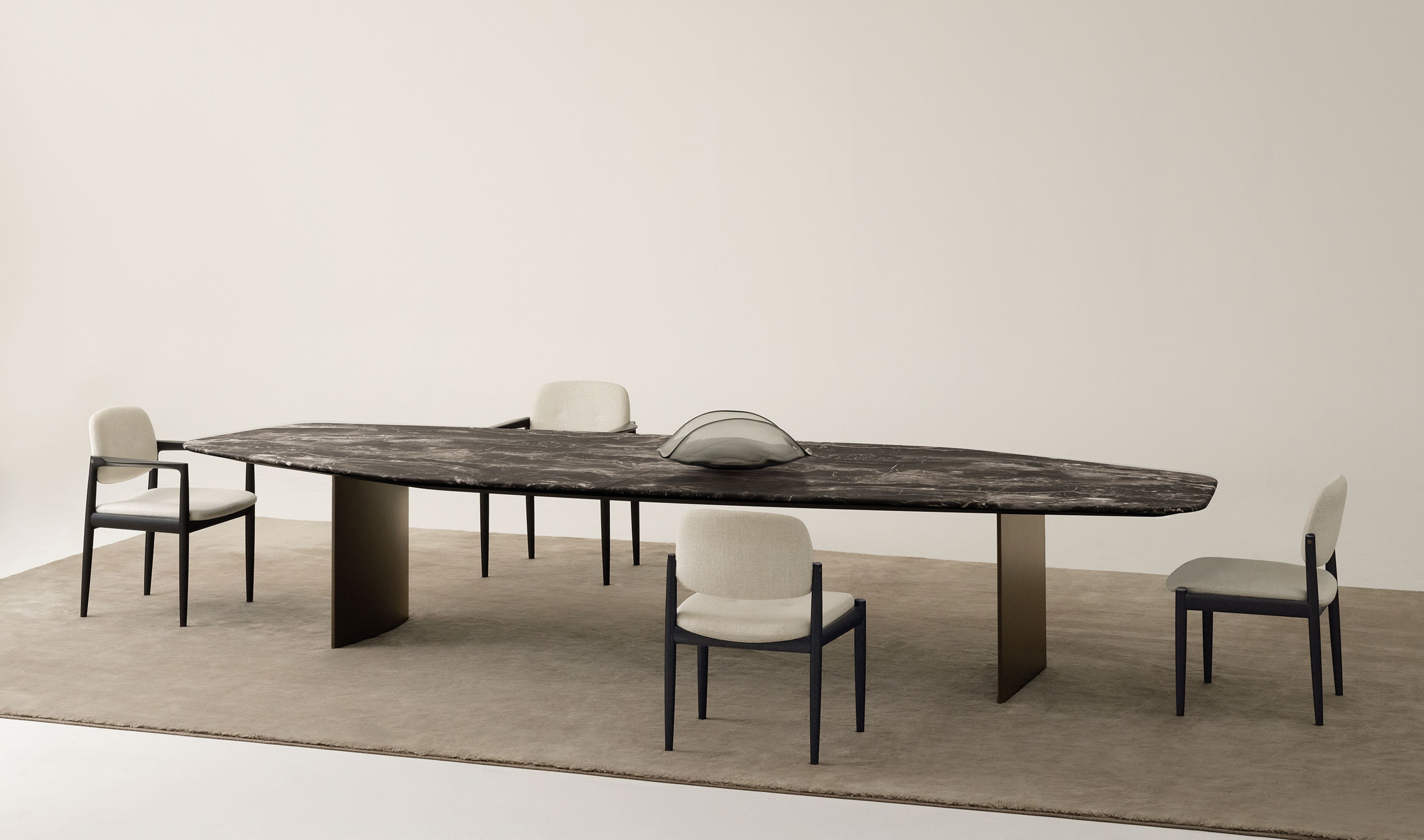 Dining table of a dynamic polygonal form by Minotti.