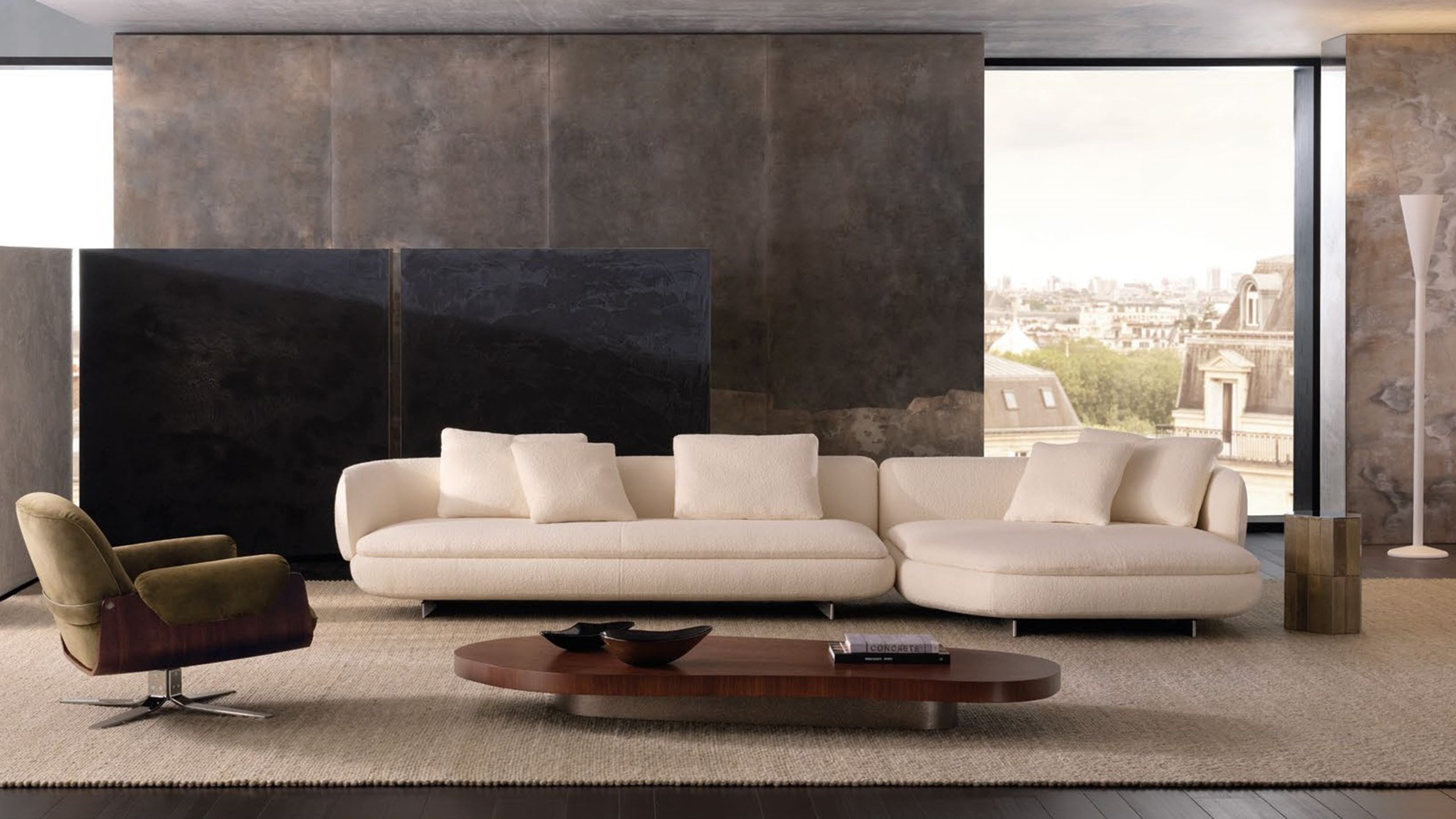 A fluid seating system by Minotti, where generous curves and geometric rigour meet in a light, decorative, and iconic design.
