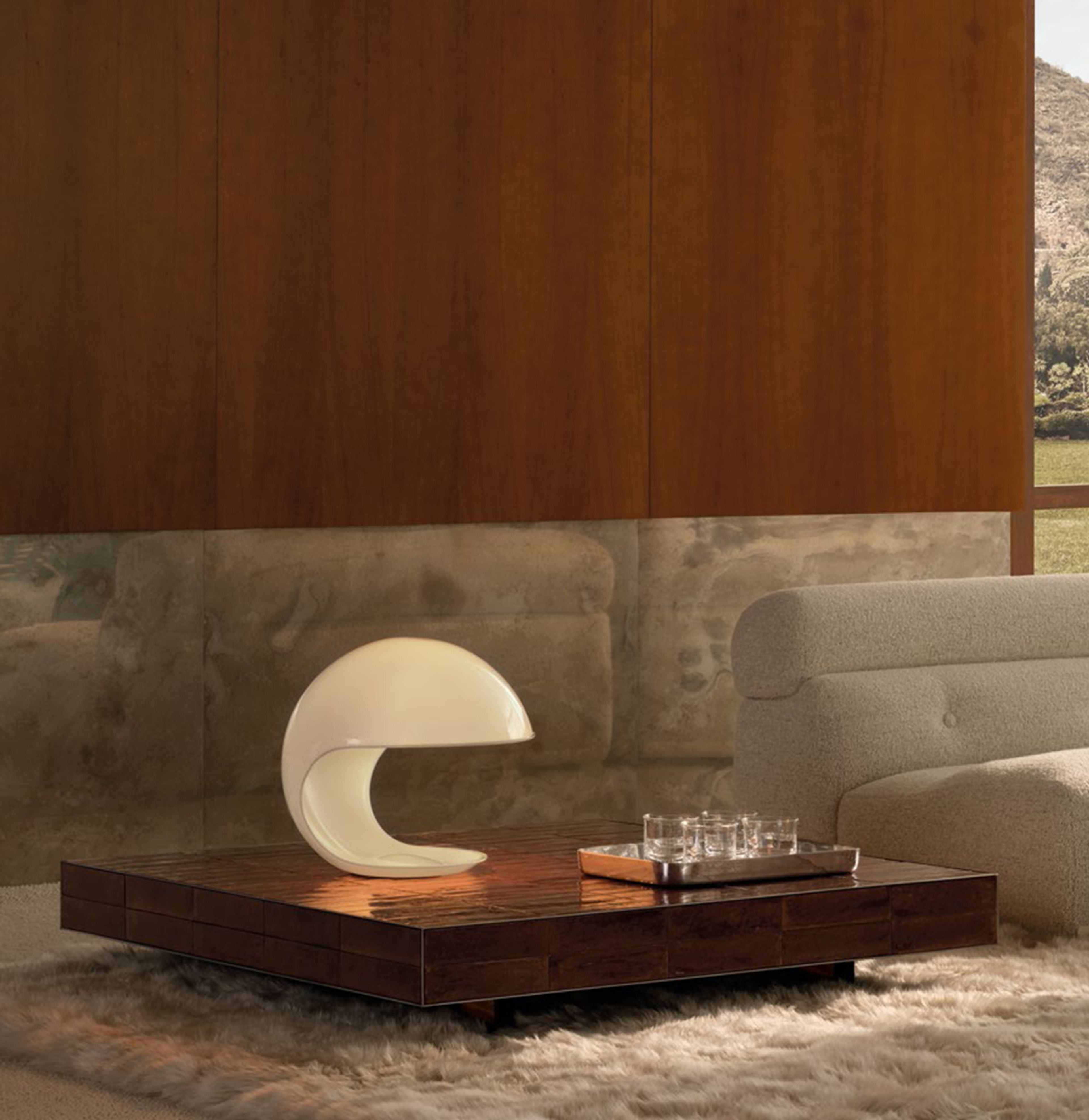 A compact ceramic coffee table from the Minotti`s Andrée family.