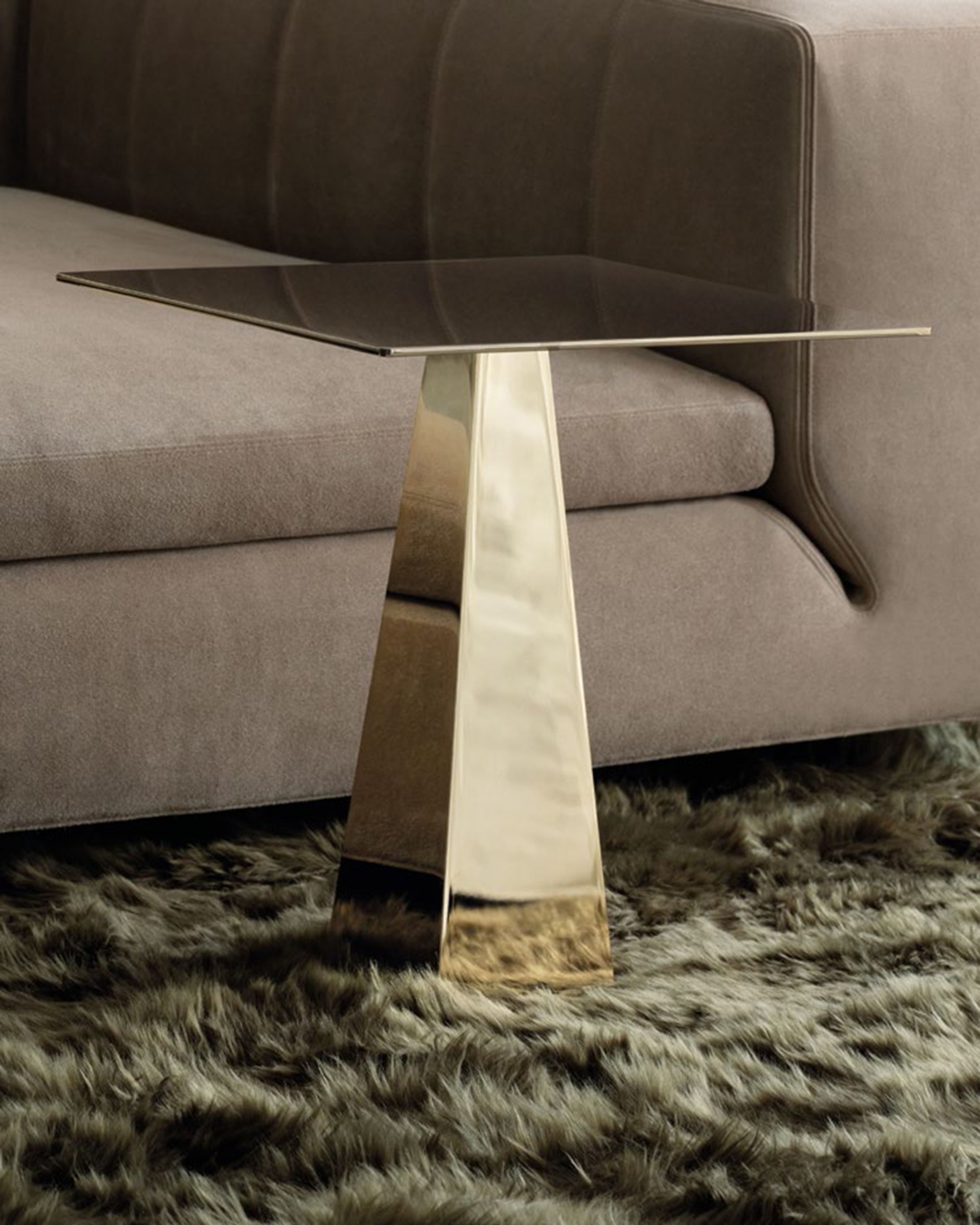 Pyramid-shaped Minotti's coffee table.