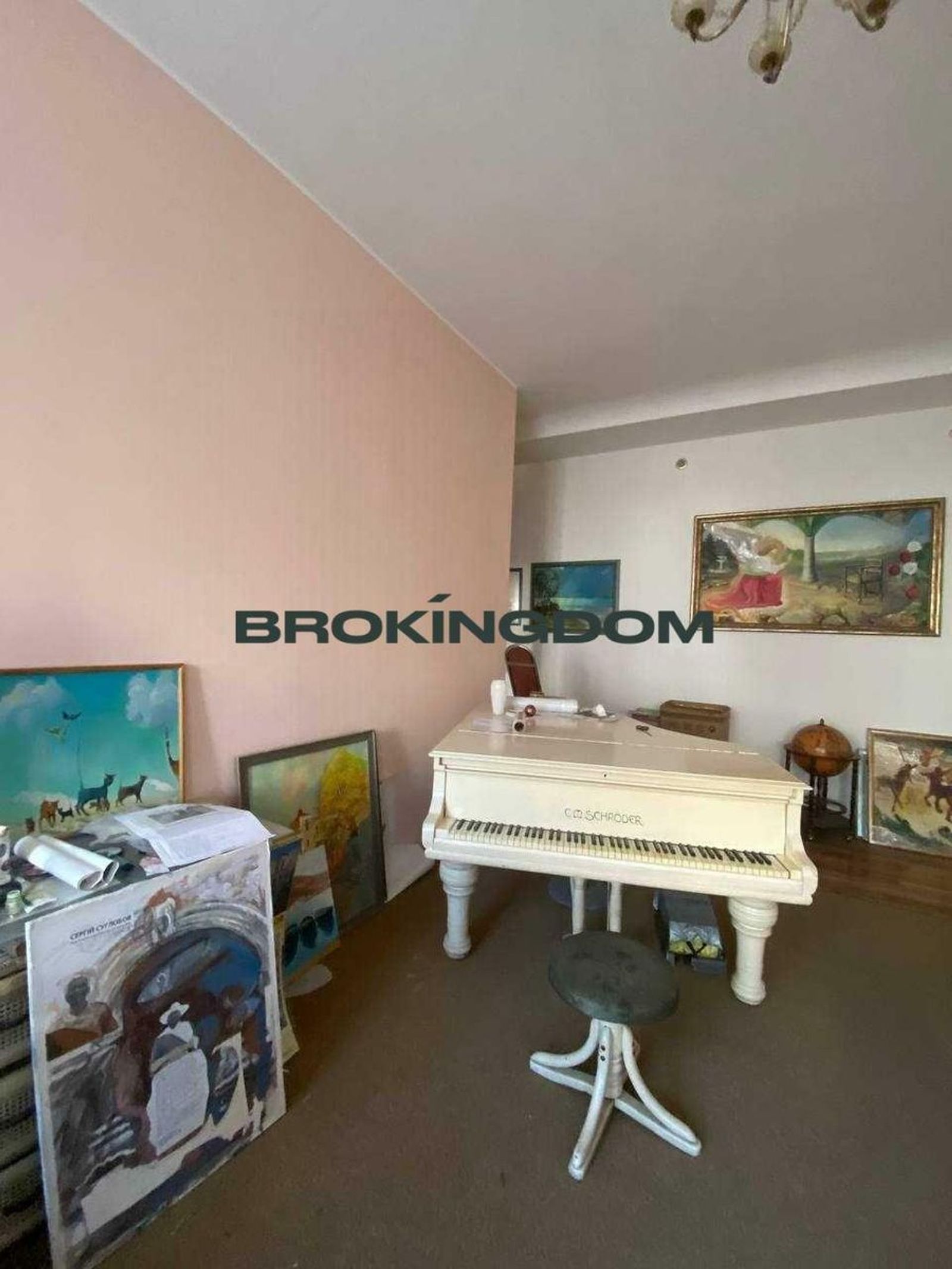White grand piano with artwork and globe in room, Tarasivska 16, Kyiv — Vestor.Estate