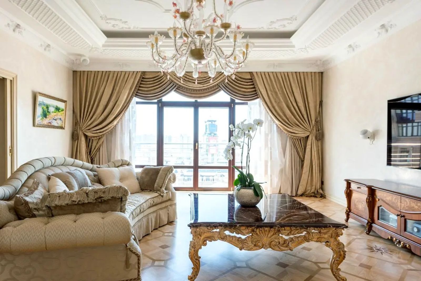 Living room with ornate chandelier and plush seating, Khreshchatyk 27B, Kyiv — Vestor.Estate