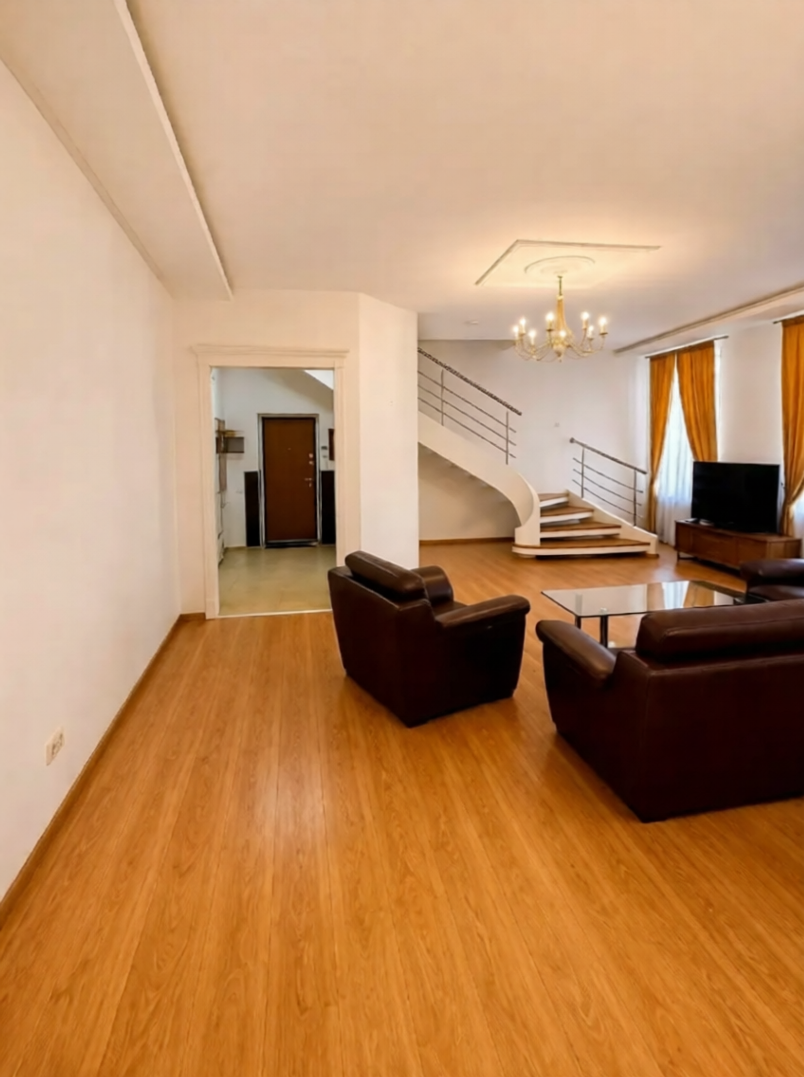 Living room in a renovated duplex apartment on Tarasa Shevchenka Lane, Kyiv
