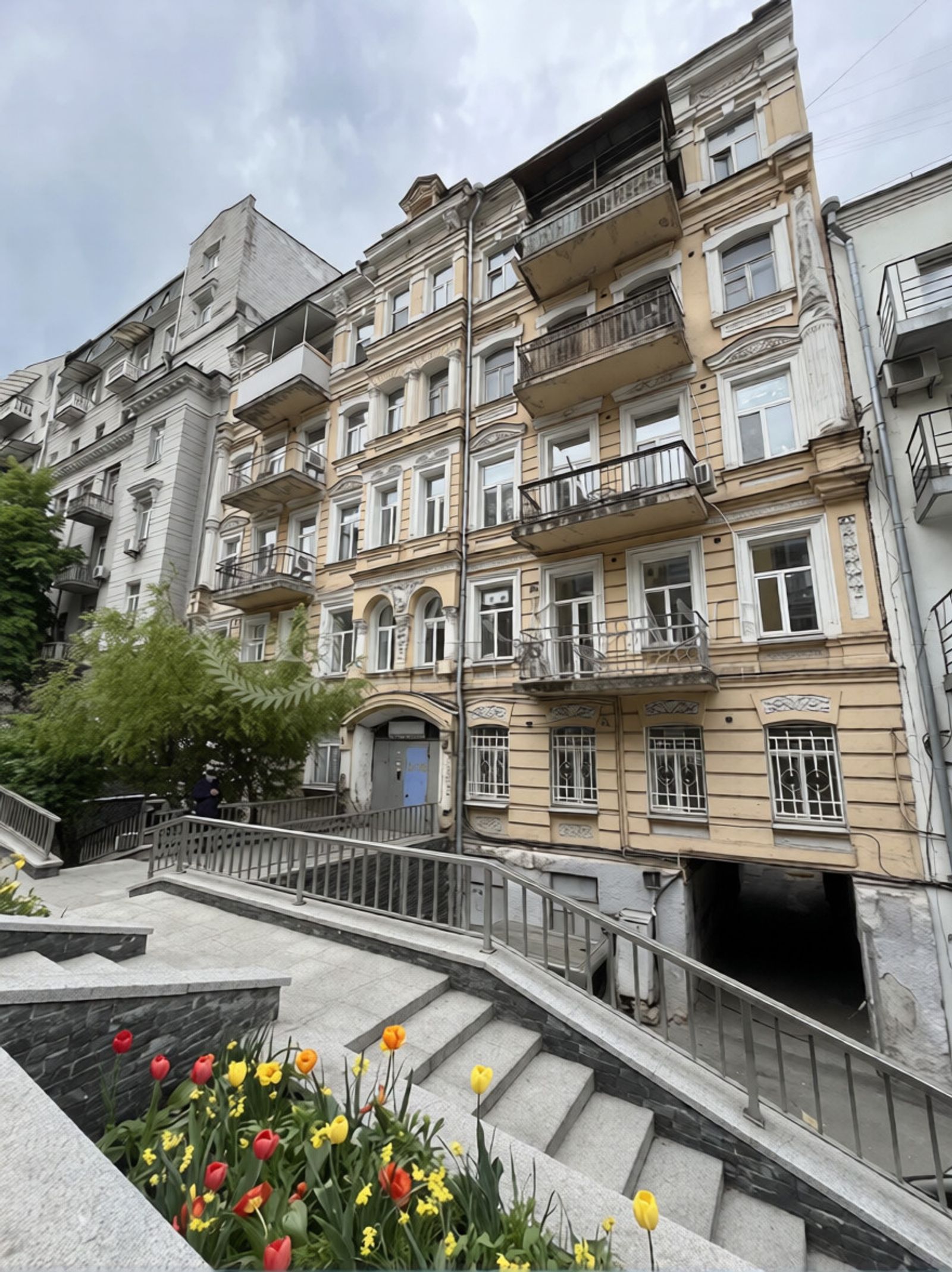 Apartment building with balconies and flower-lined stairs, Ivana Franka 20, Kyiv — Vestor.Estate