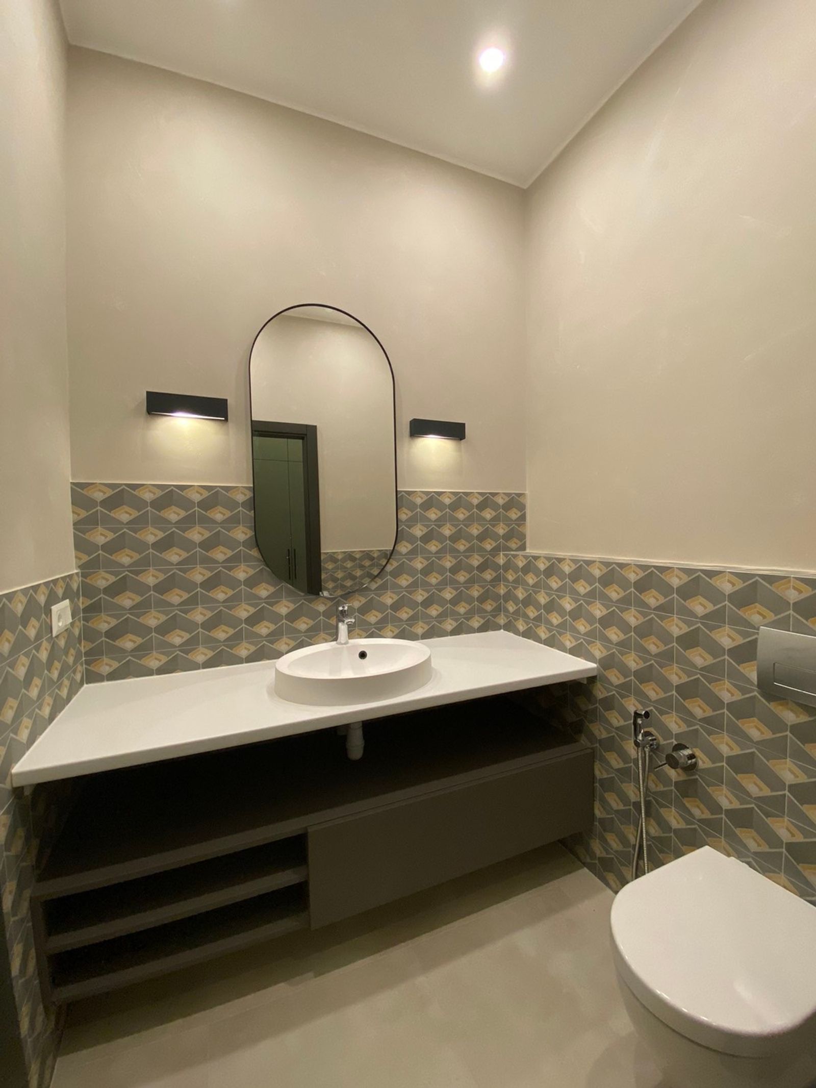 Modern bathroom with floating vanity and geometric tile, Velyka Zhytomyrska 25/2, Kyiv — Vestor.Estate