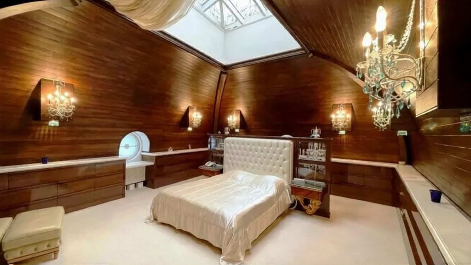 Luxurious bedroom with wood paneling and crystal chandeliers, Volodymyrska 20/1A, Kyiv — Vestor.Estate
