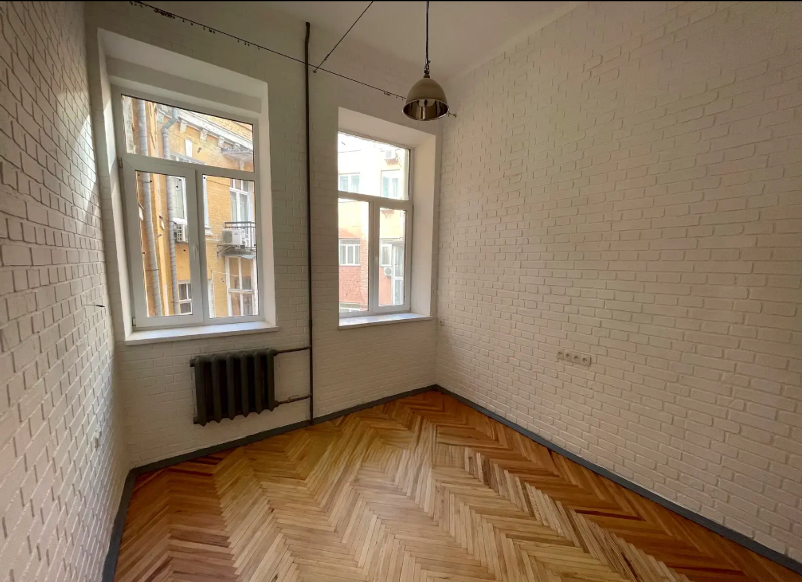 Bedroom in a renovated apartment on Kostelna Street 5, Kyiv