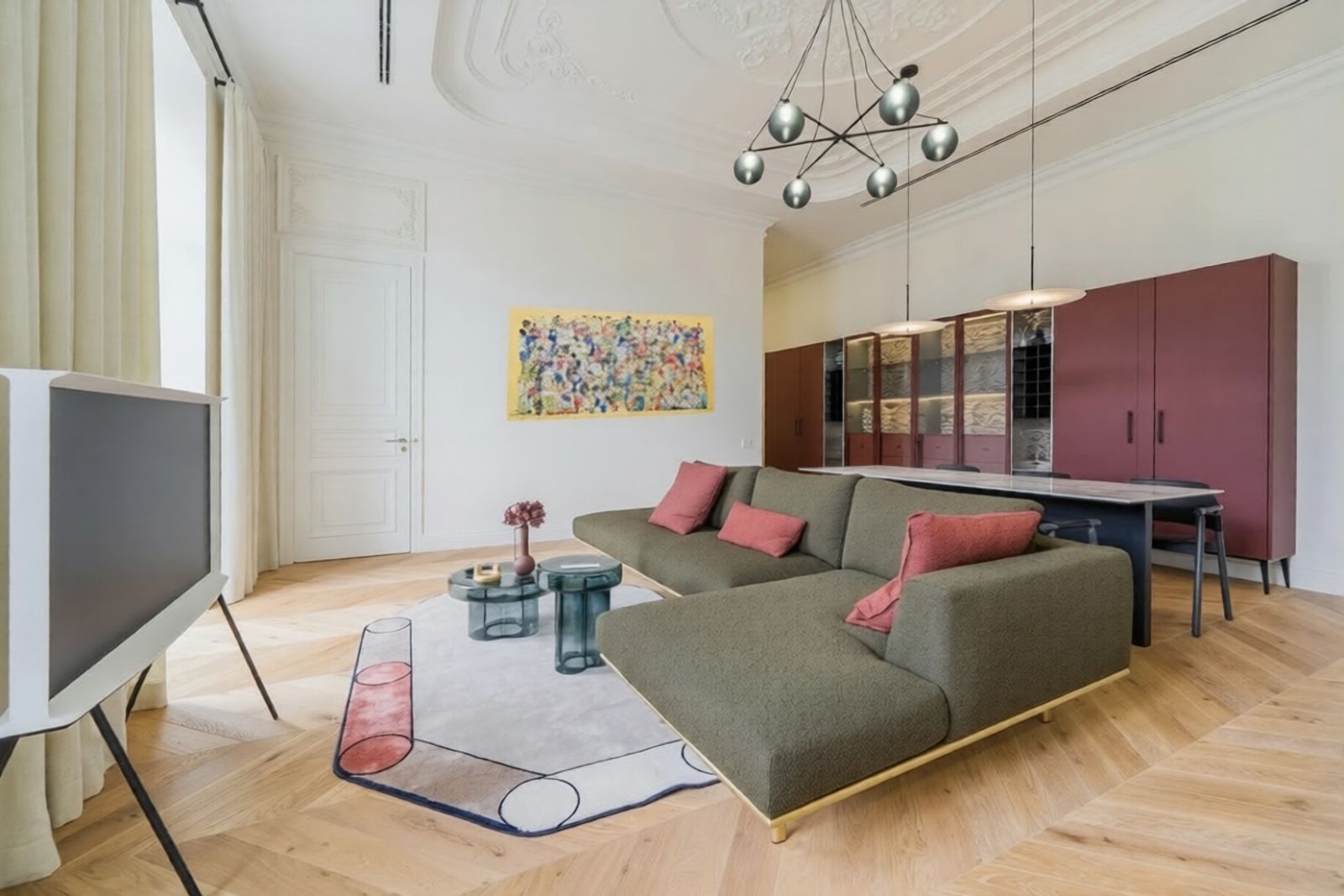 Living room with sectional, modern chandelier, and wine cabinet, Zankovetskoi 7, Kyiv — Vestor.Estate