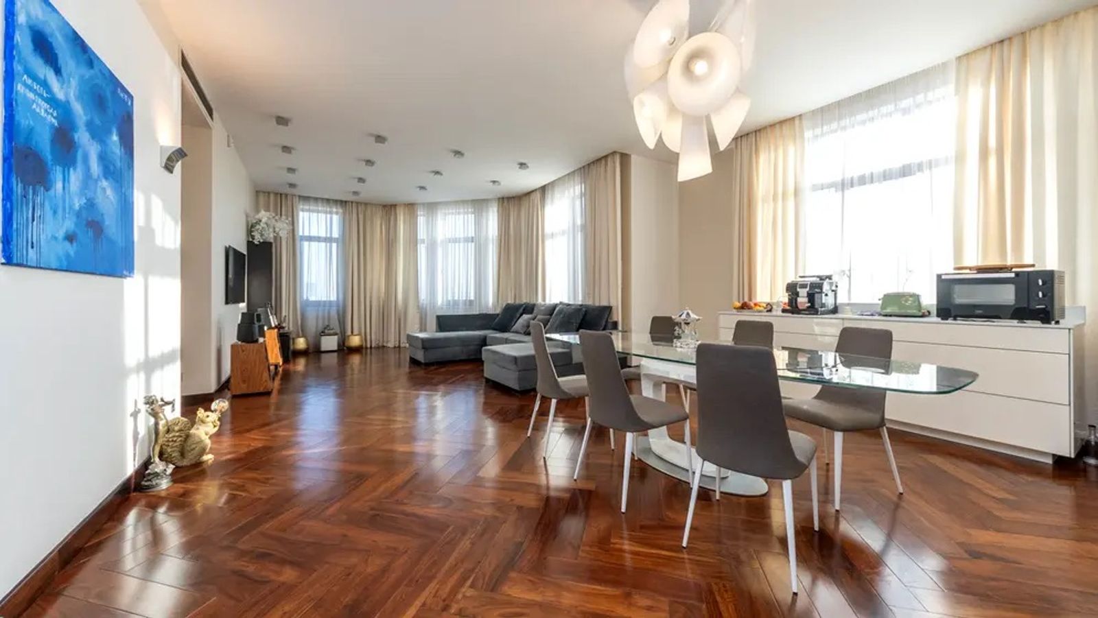 Spacious living and dining area with polished wood floors, Ivana Franka 4B, Kyiv — Vestor.Estate
