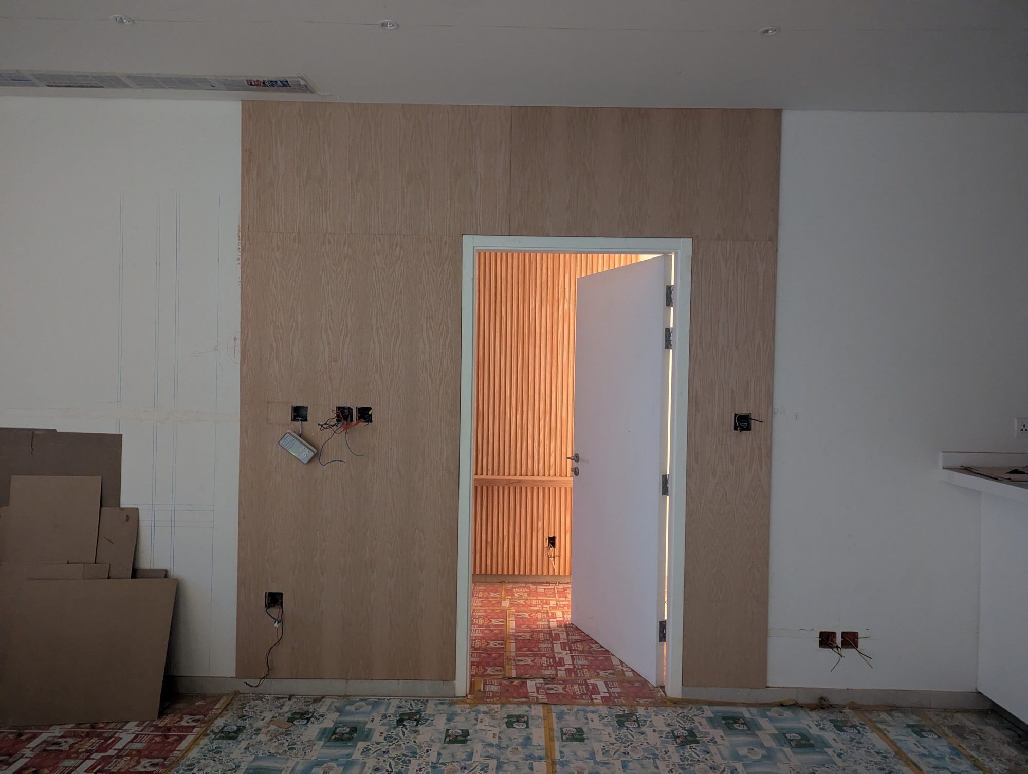 Timber wall panelling being installed