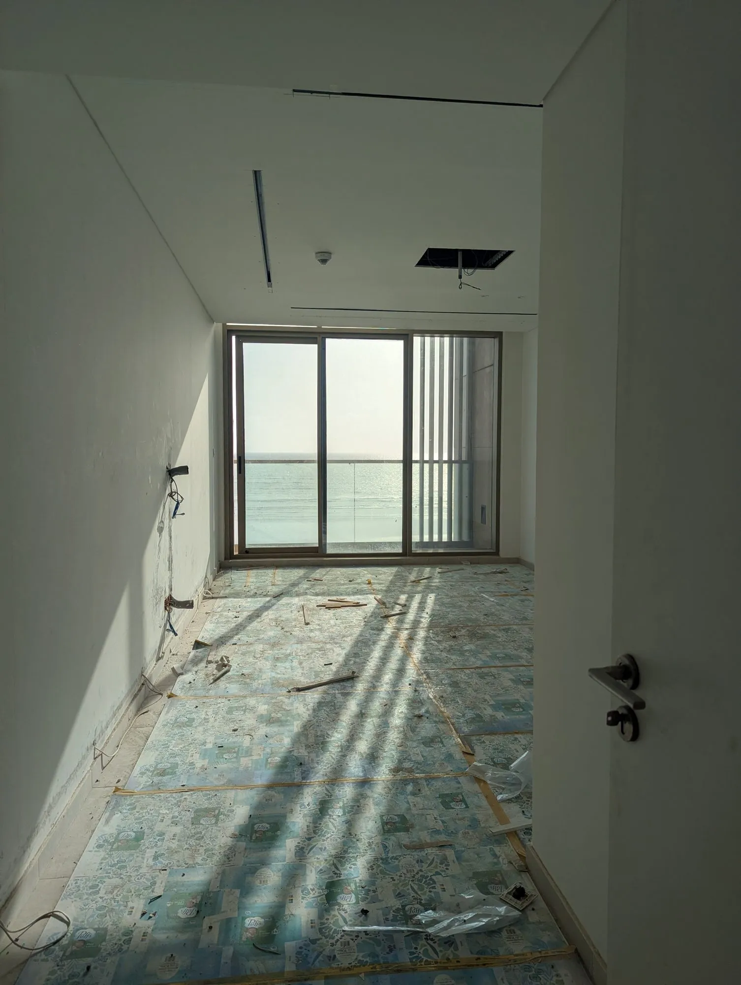 The bedroom during fit-out, looking towards the sea