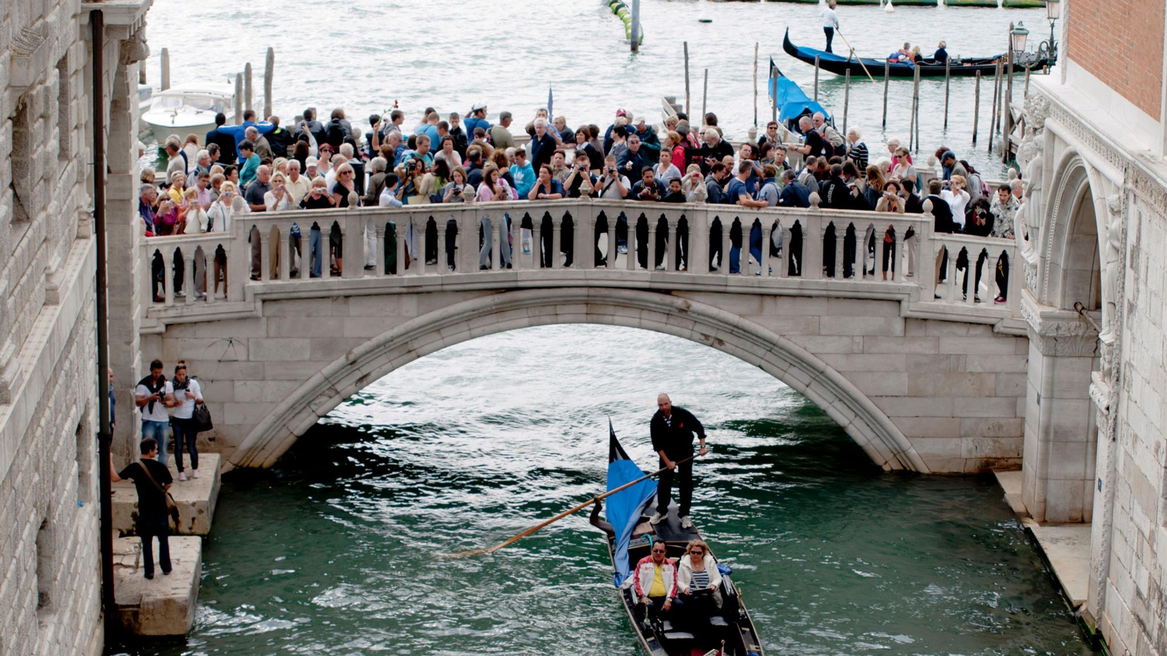 The City of Venice has announced new limits on the size of tourist groups - the latest move to reduce the pressure on the city of mass tourism.