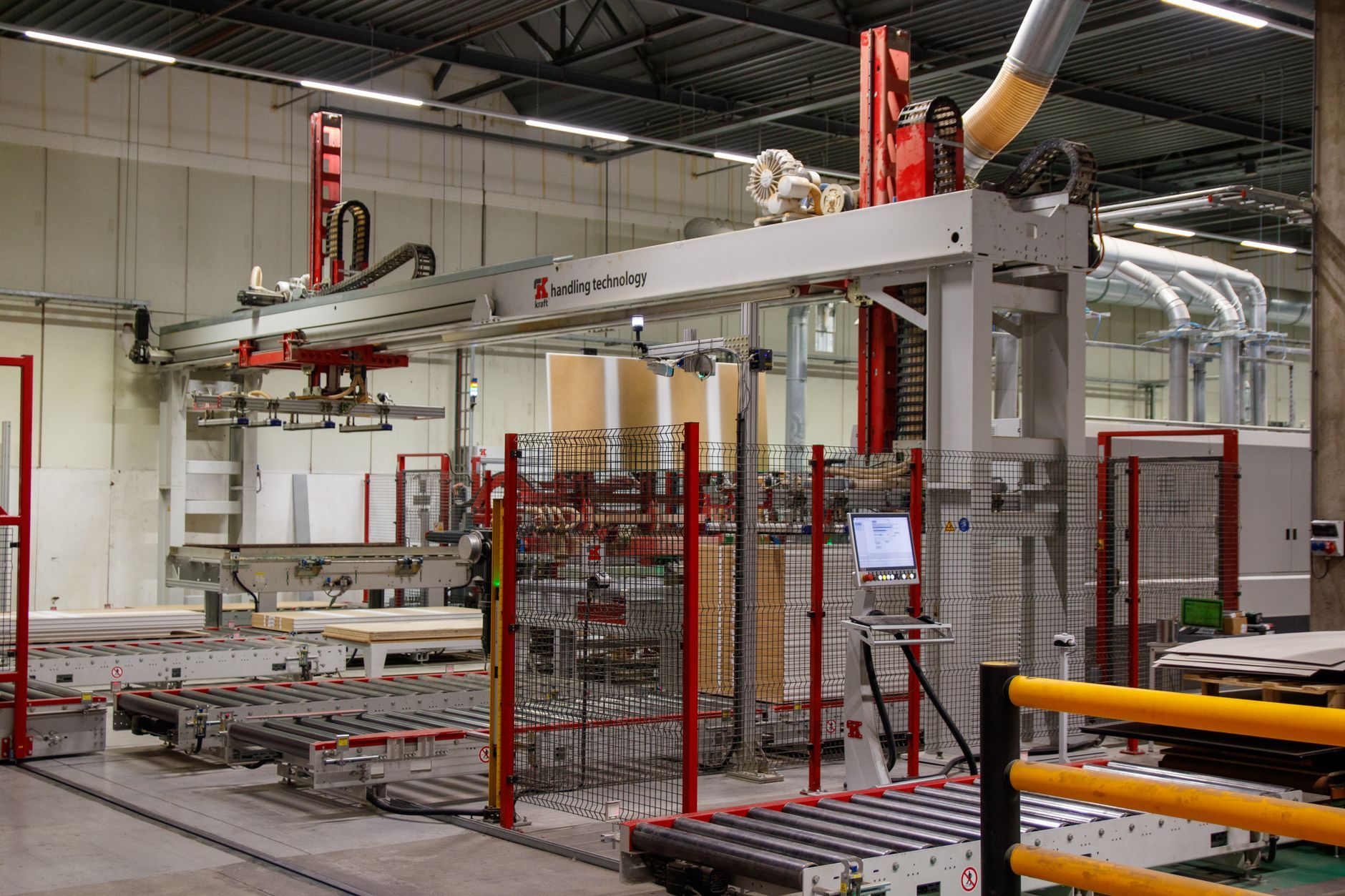 An automated conveyor line with robotic arms