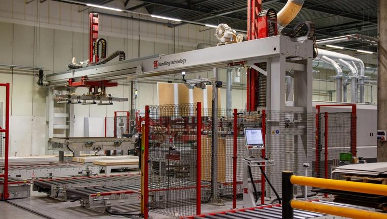 An automated conveyor line with robotic arms