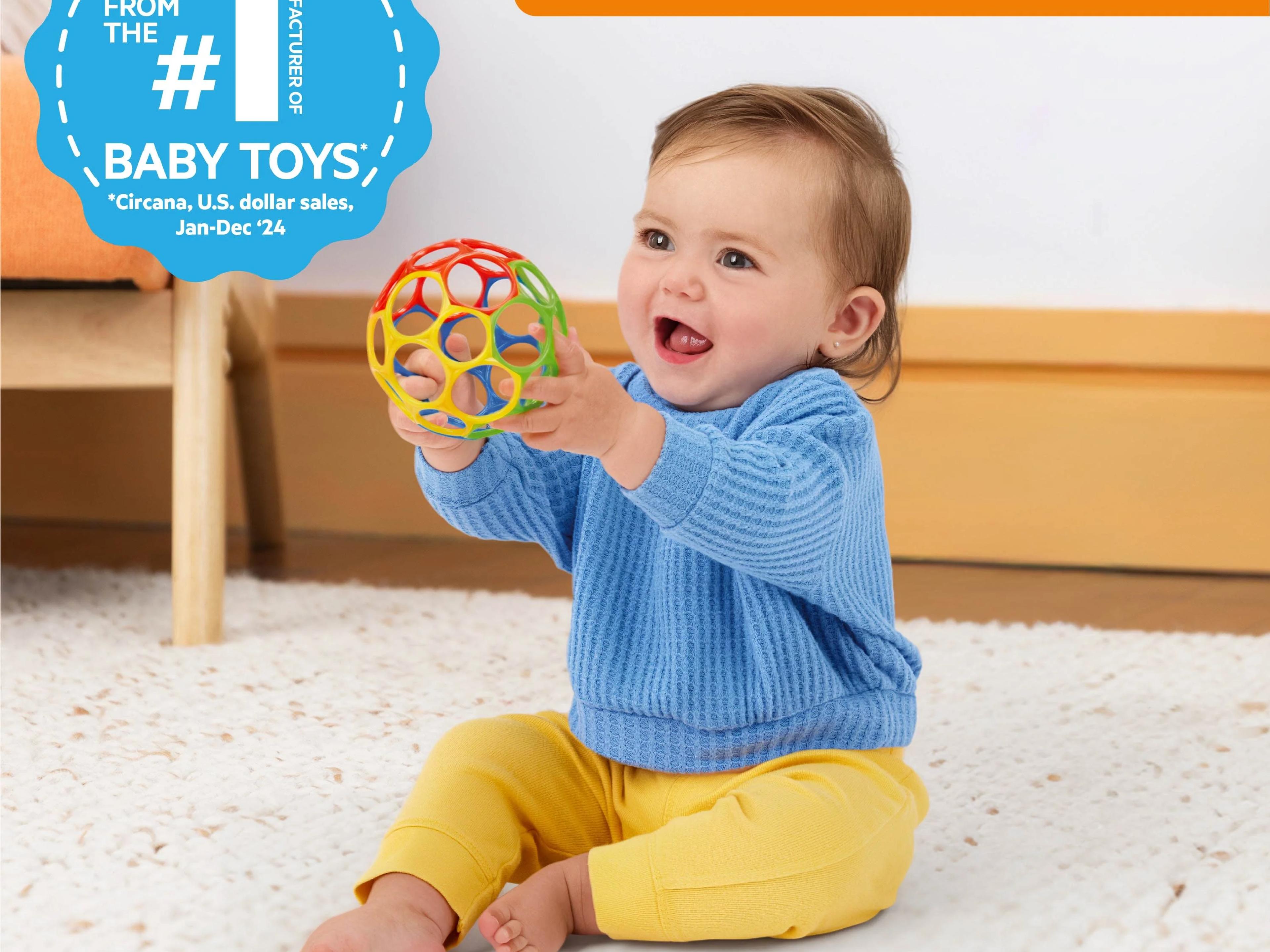 Oball Classic easy-grasp baby ball with flexible finger holes in red, blue, green, and yellow