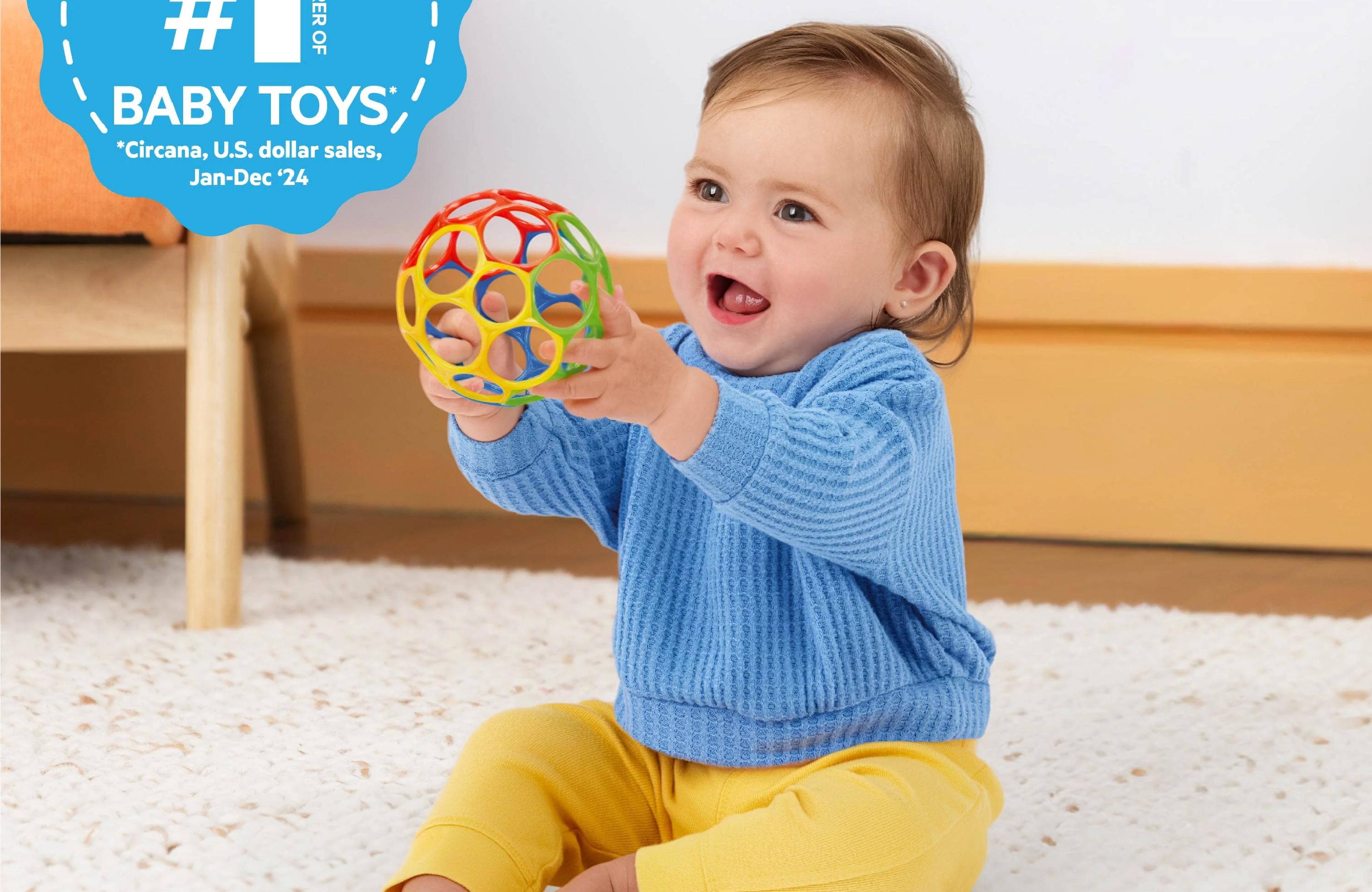 Oball Classic easy-grasp baby ball with flexible finger holes in red, blue, green, and yellow