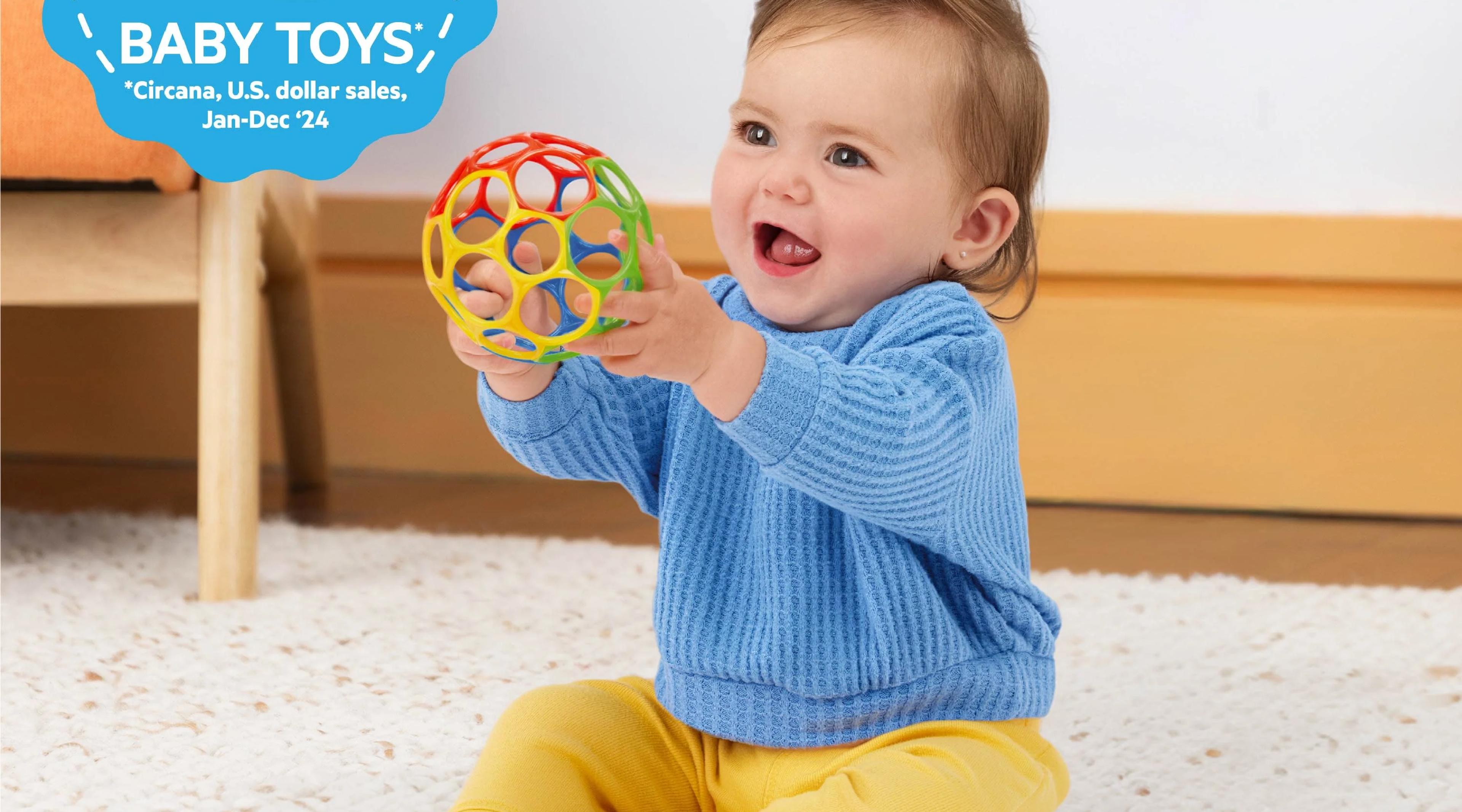 Oball Classic easy-grasp baby ball with flexible finger holes in red, blue, green, and yellow