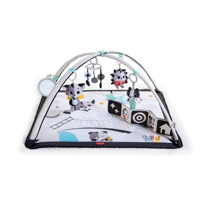 Tiny Love Magical Tales black and white Gymini activity gym with hanging toys