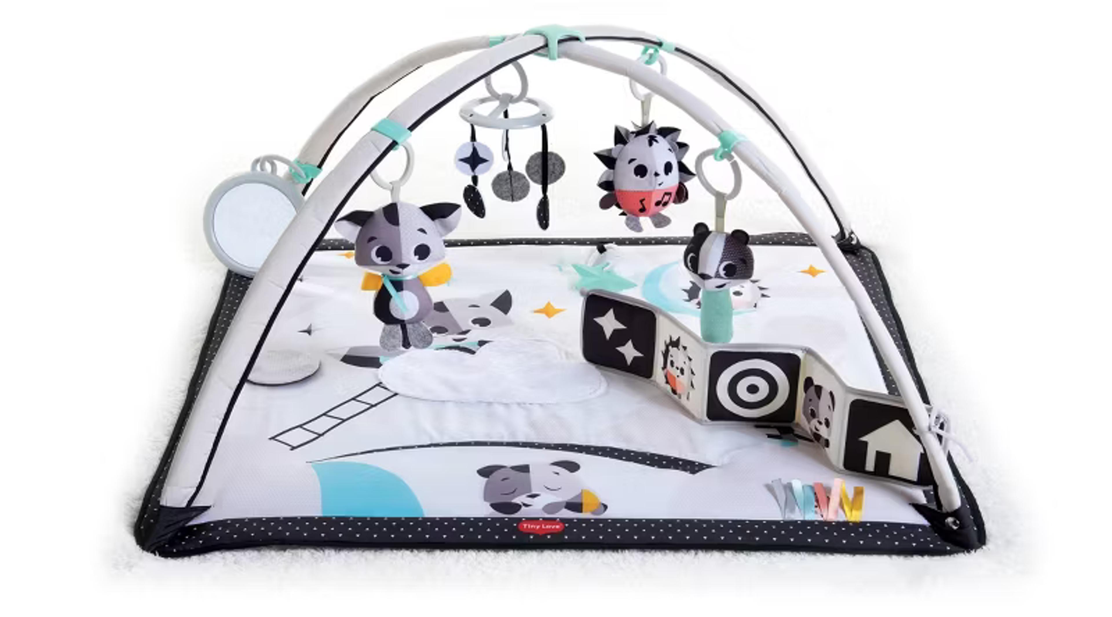 Tiny Love Magical Tales black and white Gymini activity gym with hanging toys