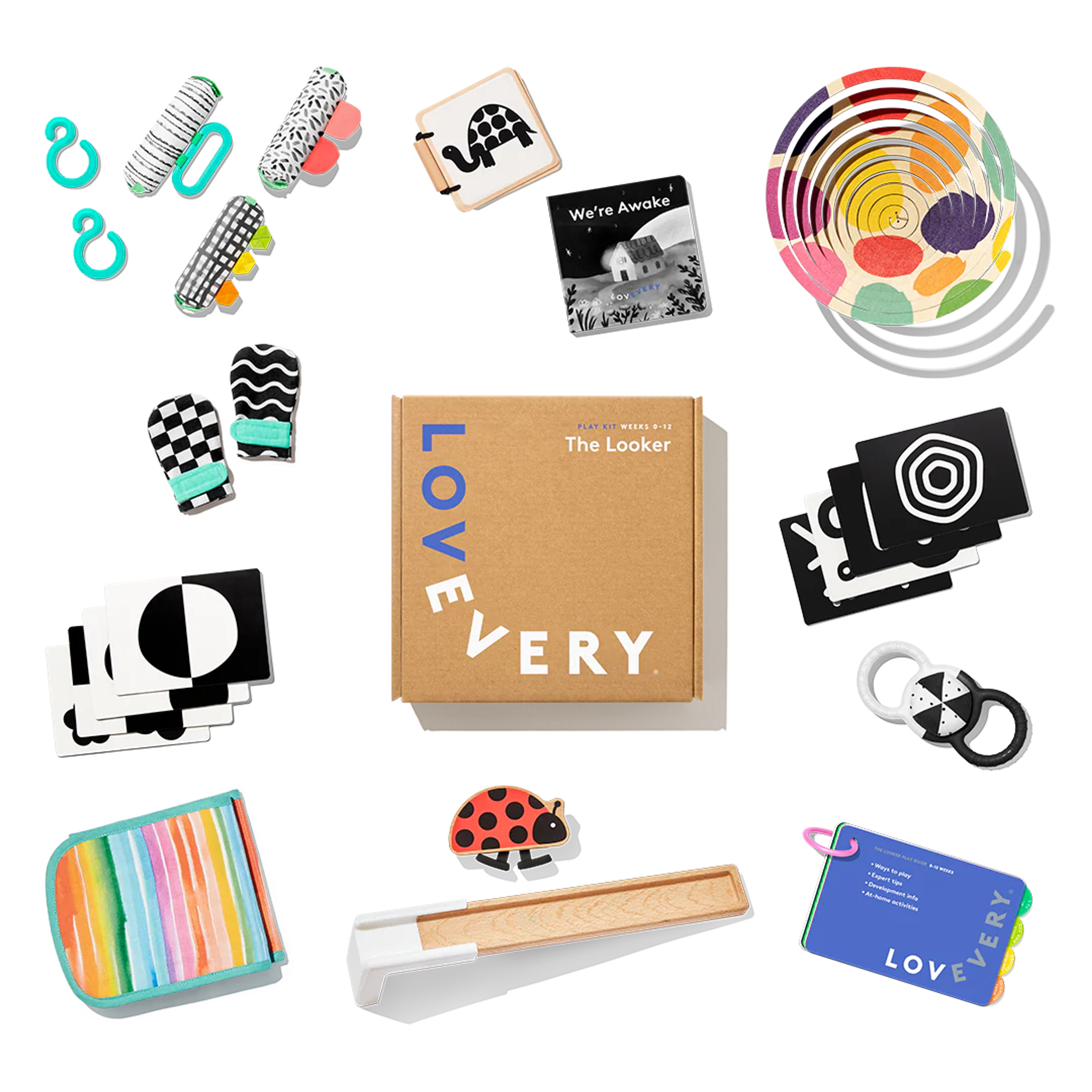 Lovevery The Looker Play Kit baby toys flatlay with high-contrast cards, mittens, and play gym pieces
