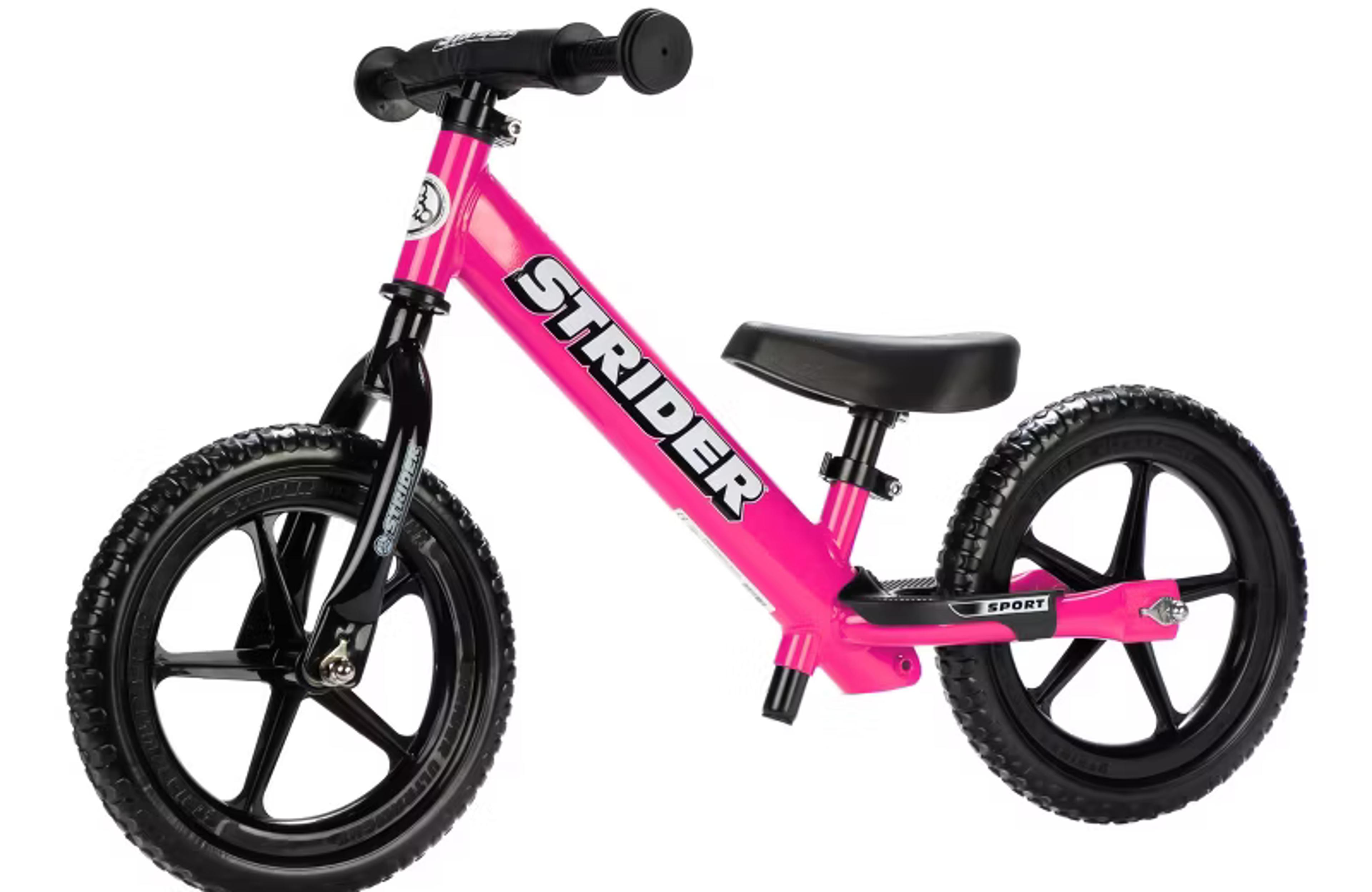 Strider 12 Sport balance bike in pink with adjustable seat and handlebar