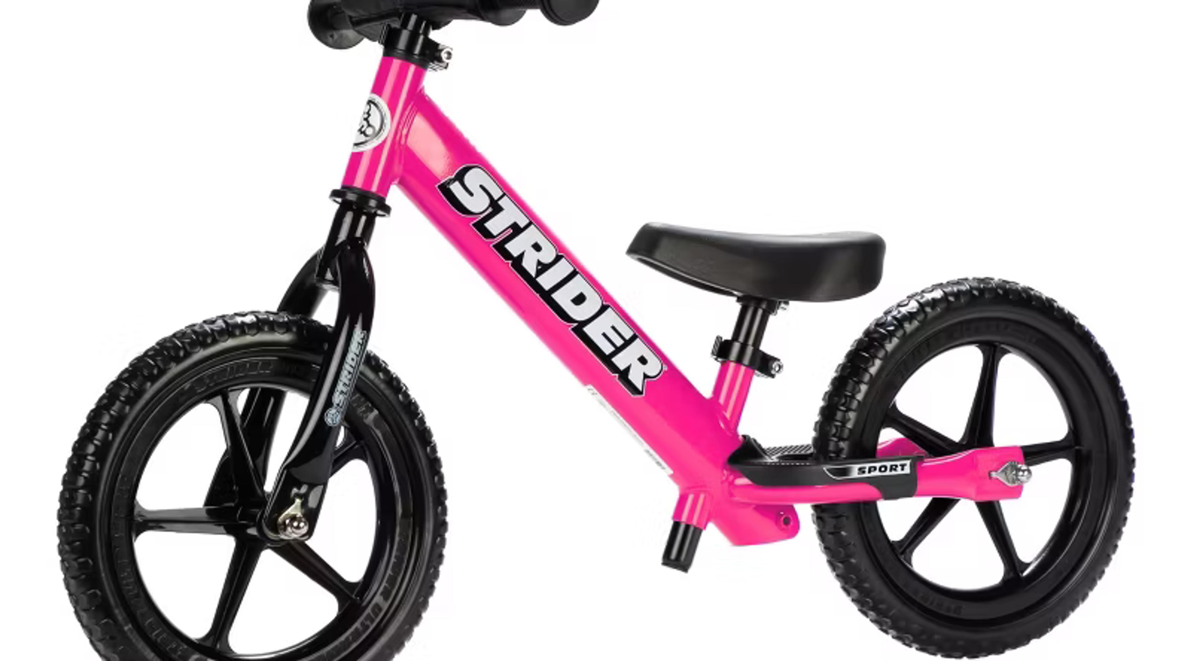 Strider 12 Sport balance bike in pink with adjustable seat and handlebar