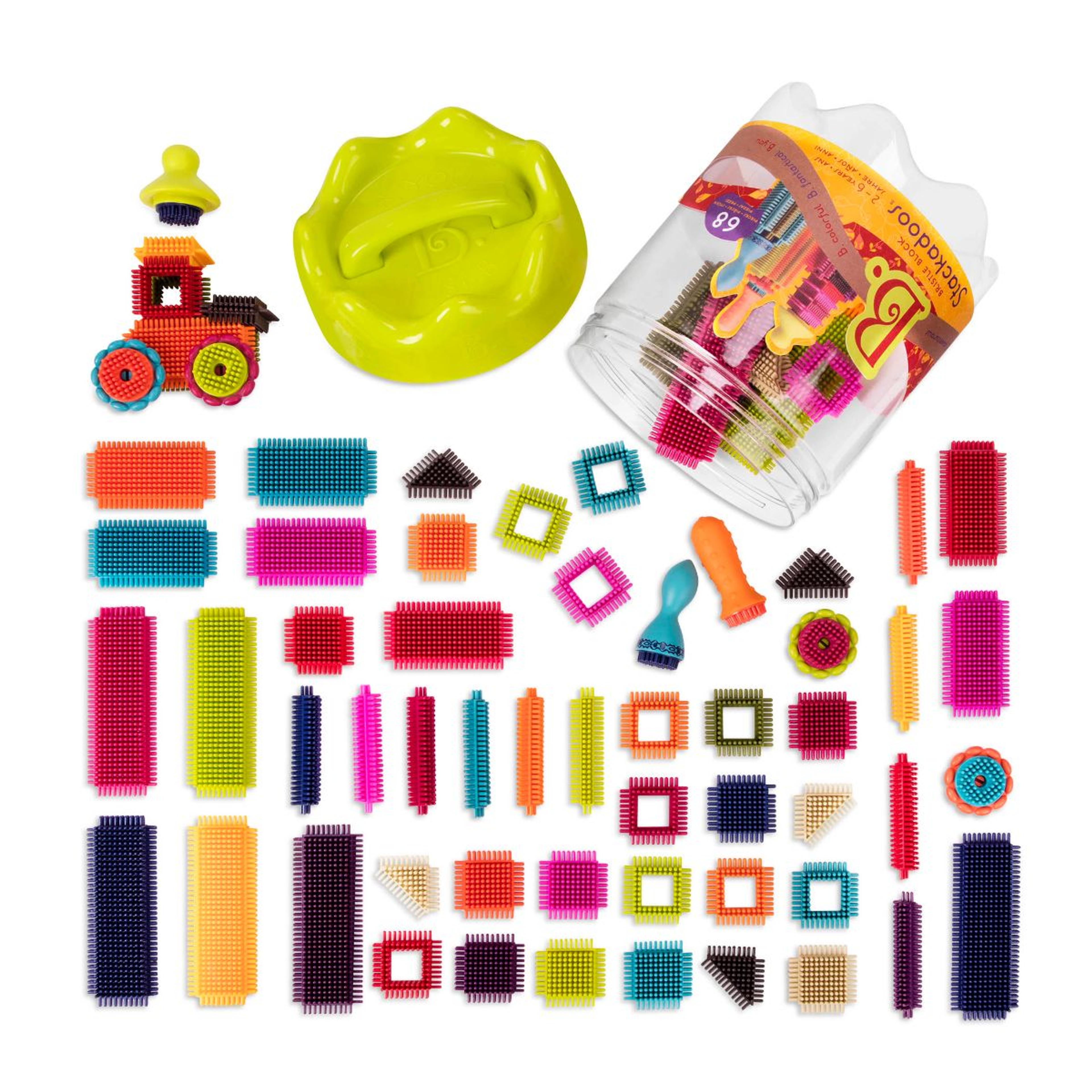 B. toys Bristle Blocks Stackadoos 68-piece set of soft interlocking bristle building blocks in a storage jar