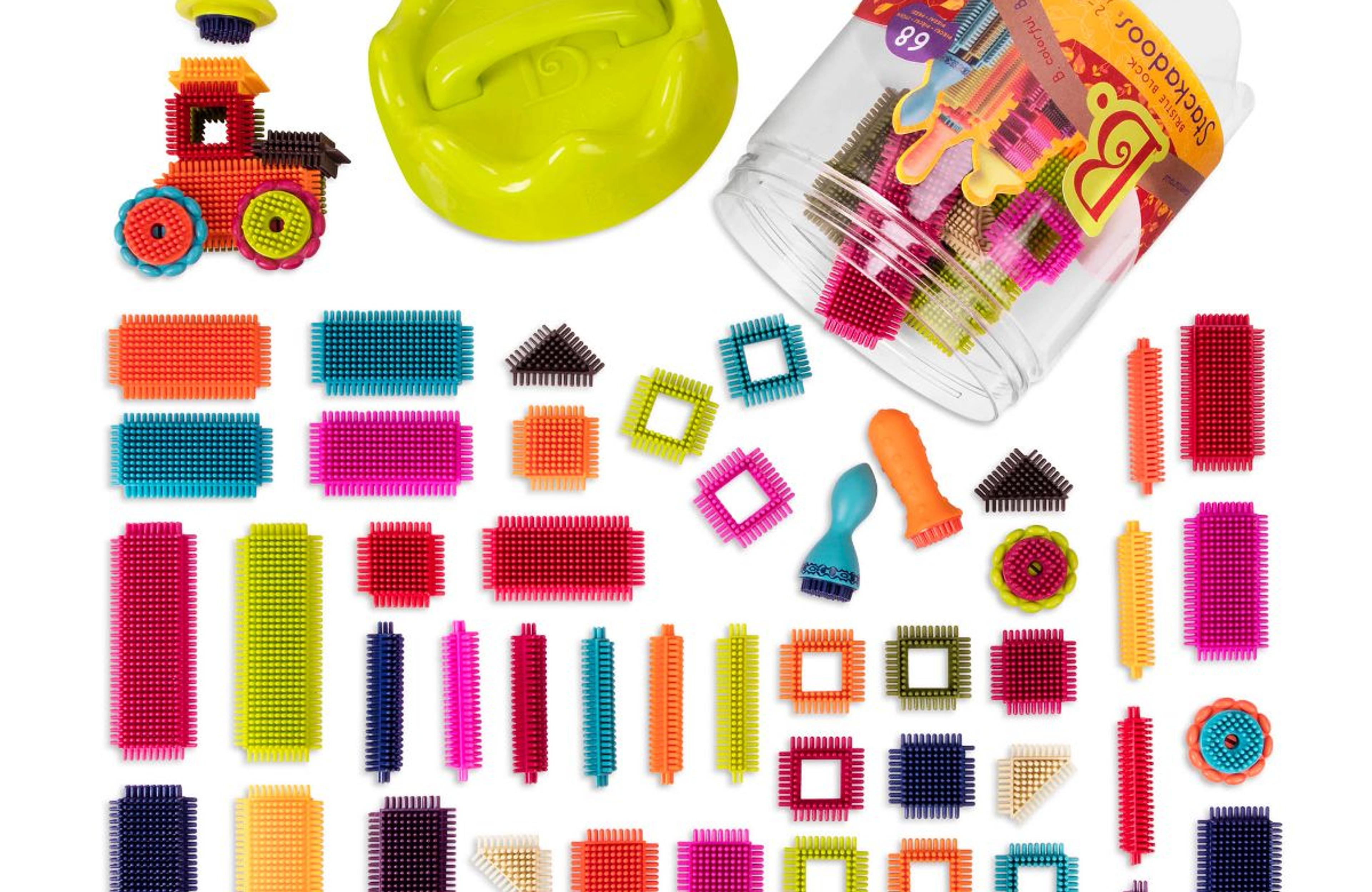 B. toys Bristle Blocks Stackadoos 68-piece set of soft interlocking bristle building blocks in a storage jar