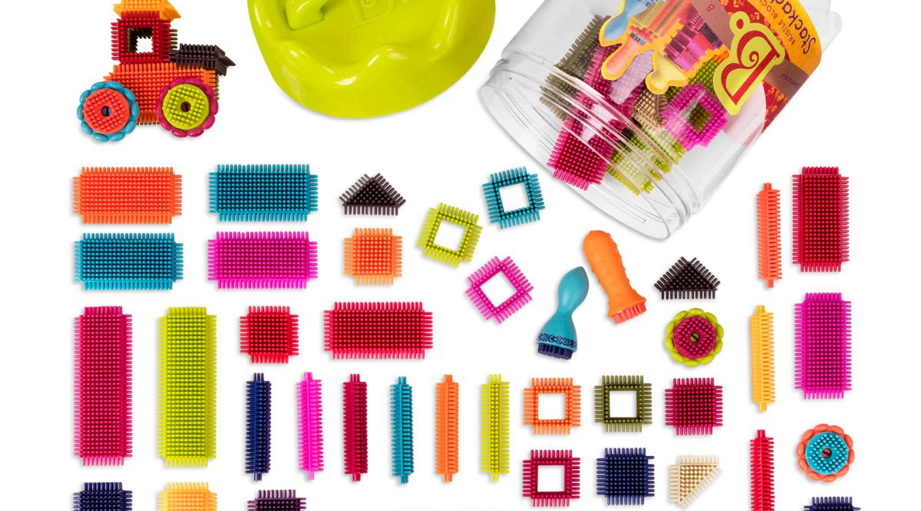 B. toys Bristle Blocks Stackadoos 68-piece set of soft interlocking bristle building blocks in a storage jar