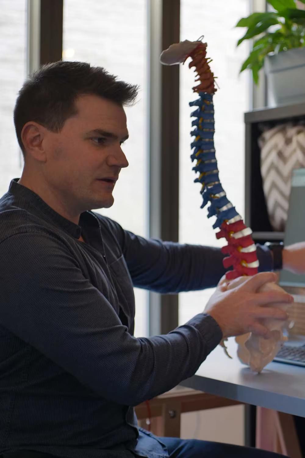 Chiro London chiropractor leading a workplace health and posture talk