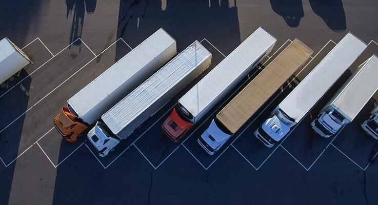 Aerial view of semi trucks at a leasing company