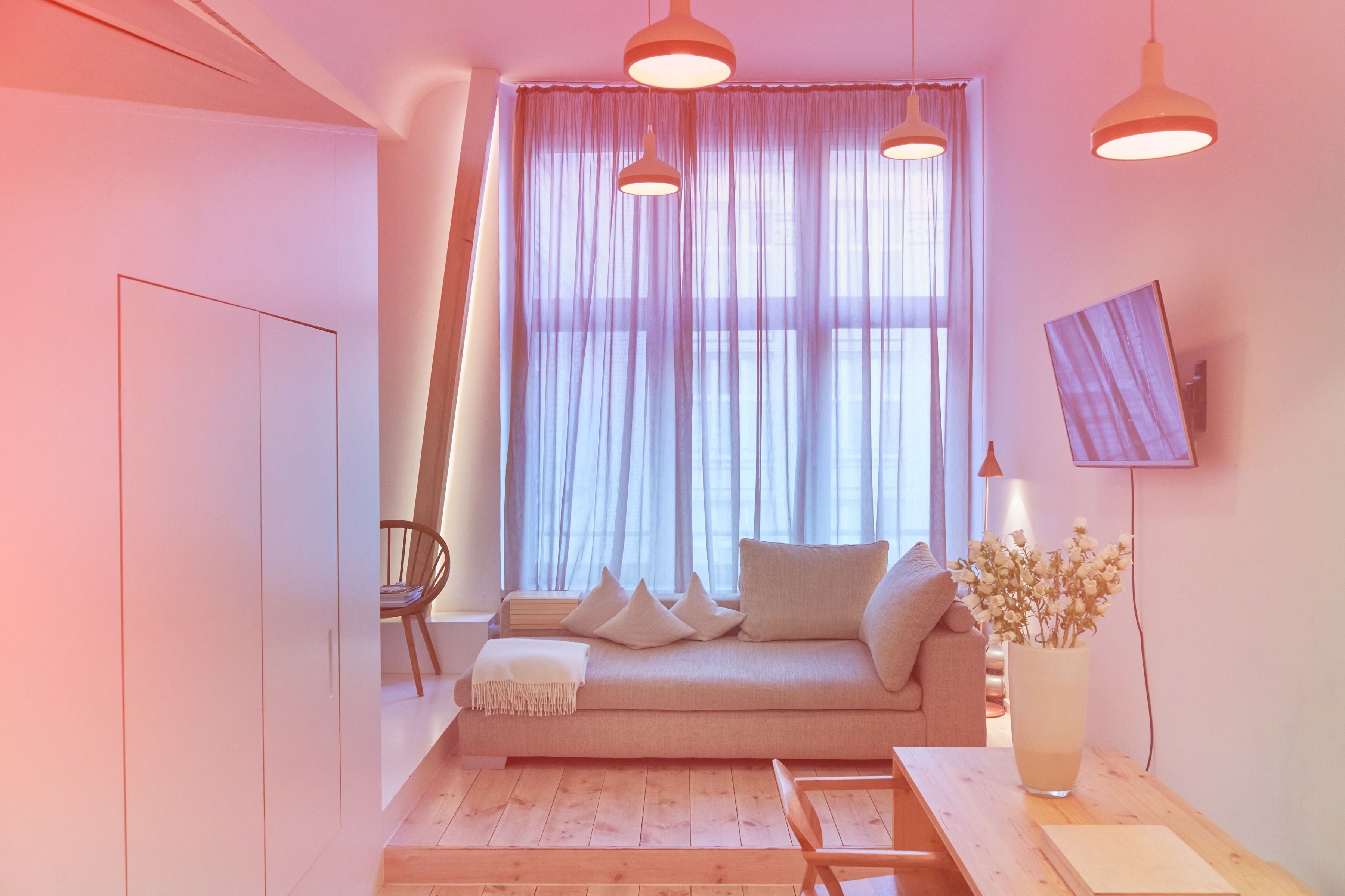 Cozy sofa in one of Michelberger Hotel's rooms