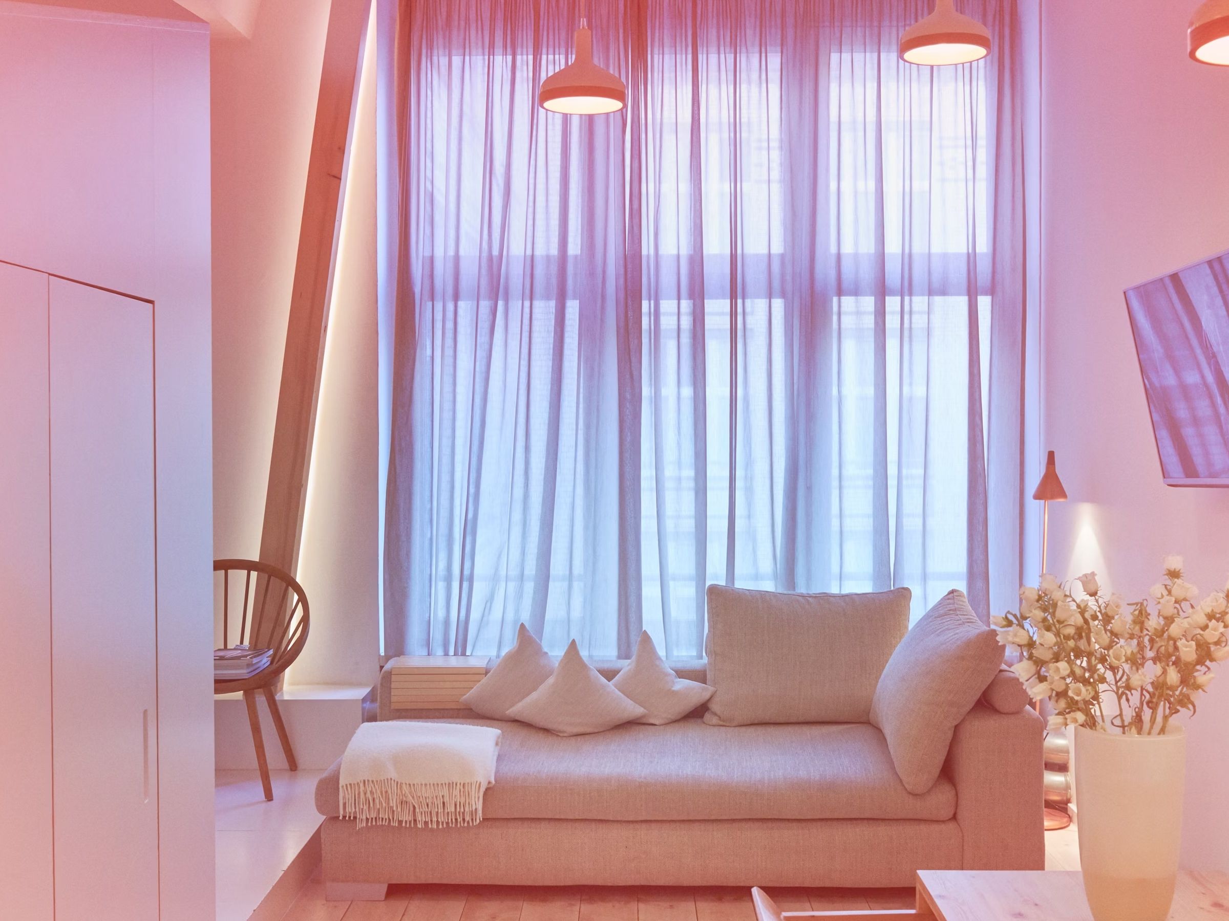 Cozy sofa in one of Michelberger Hotel's rooms