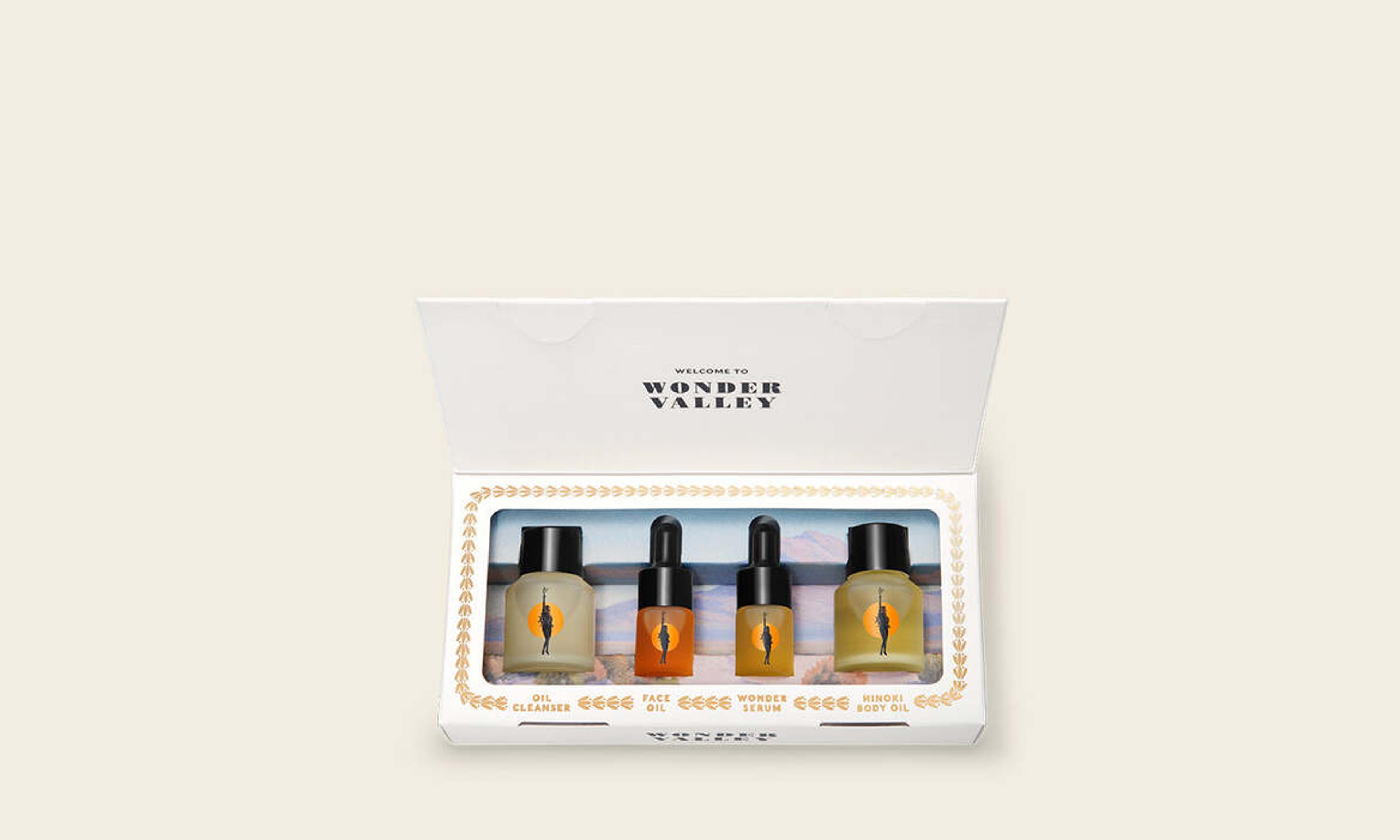 A gift set with face oil, cleanser, serum and body oil 