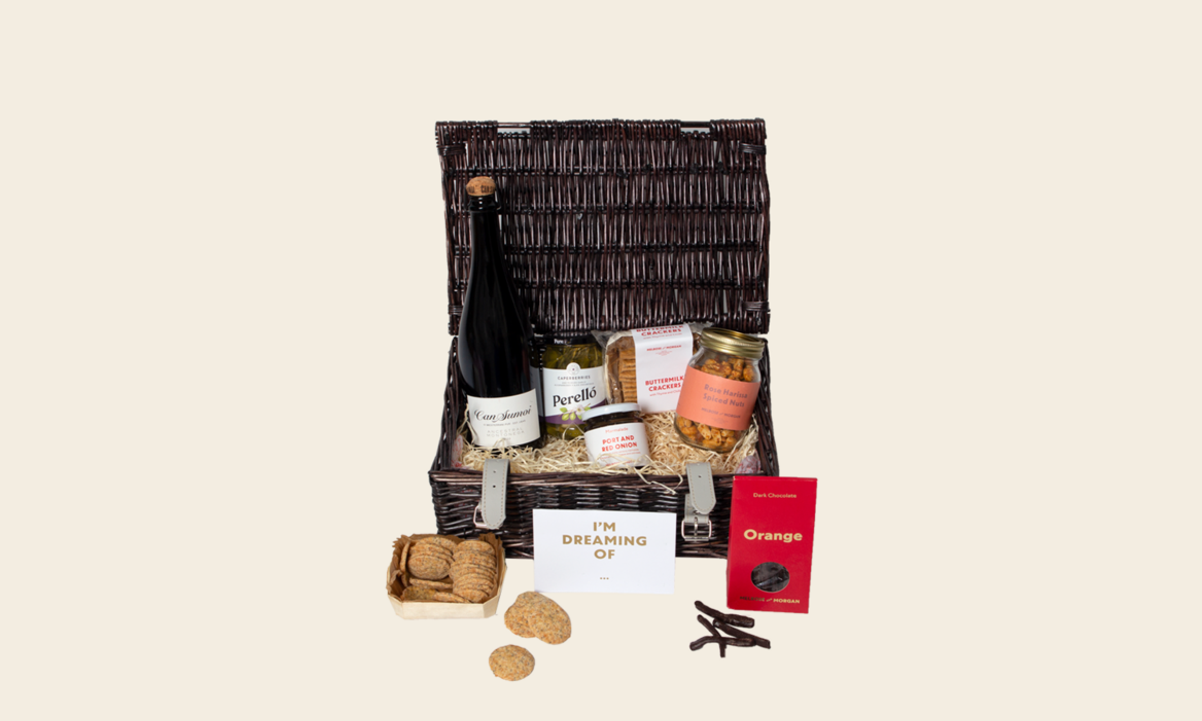 Employee gifting hamper with wine, crackers, nuts and sweet treats.