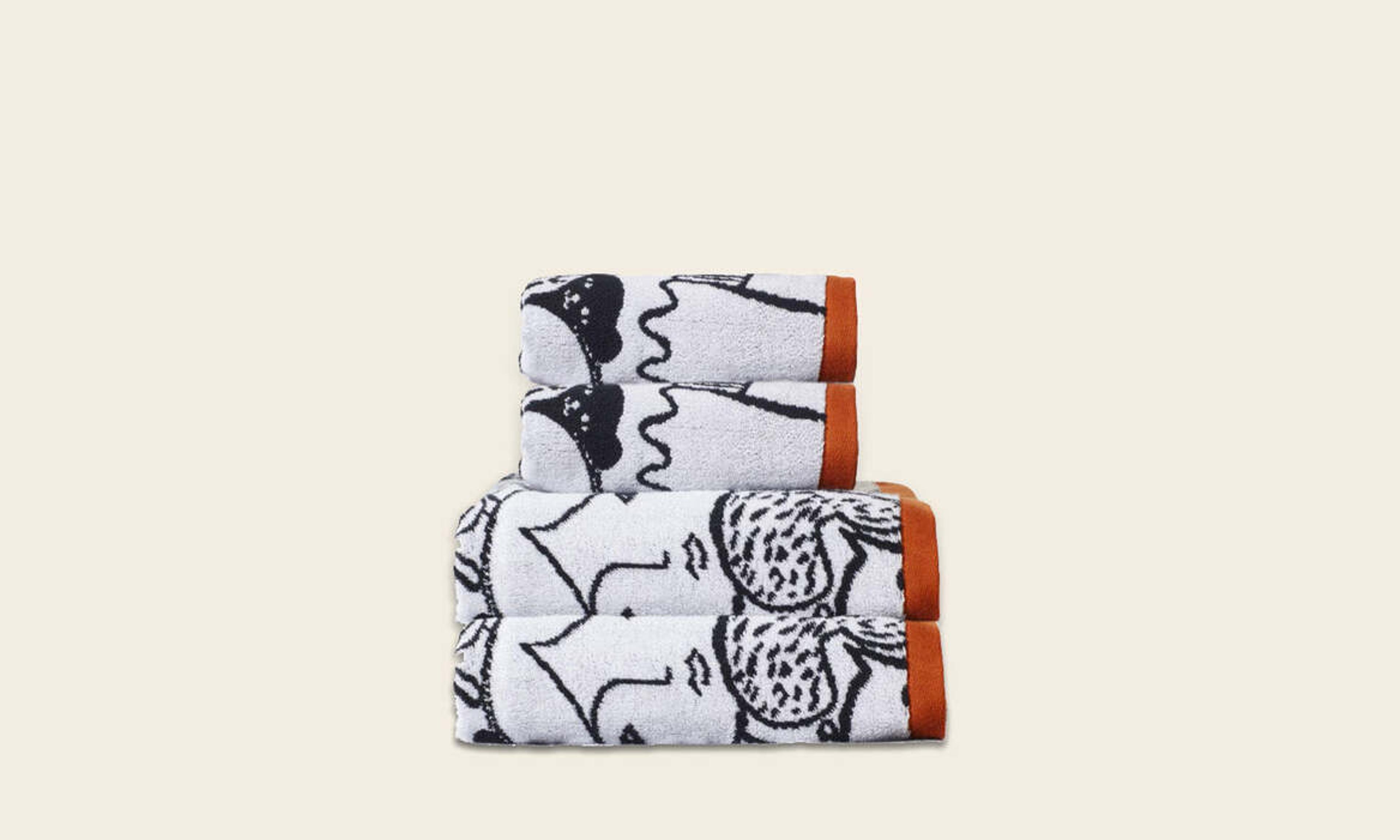 Set of 4 Donna Wilson towels with curious creatures print