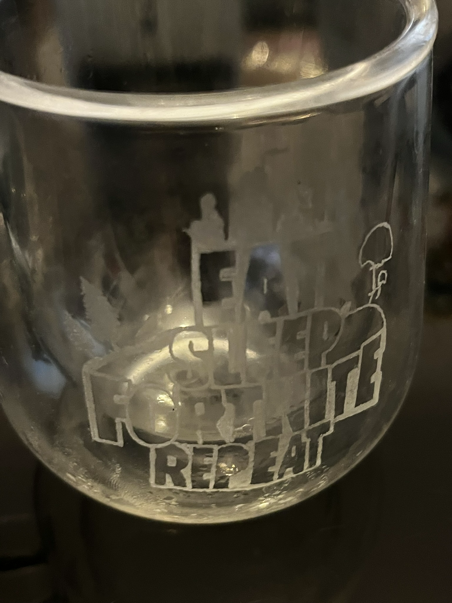 Hand engraved glass mug