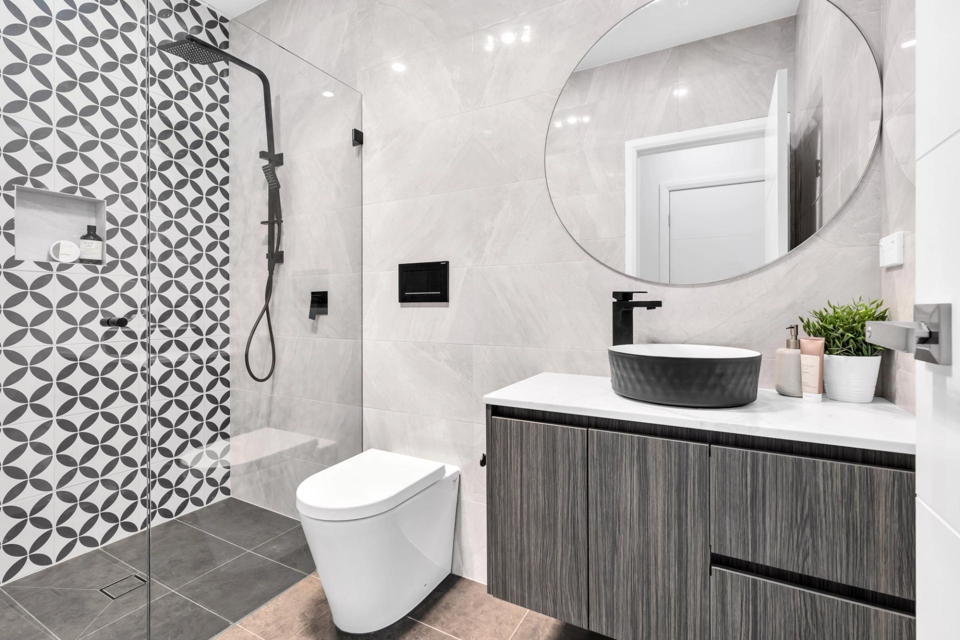 modern black and white aesthetic bathroom, built by Balwin Homes