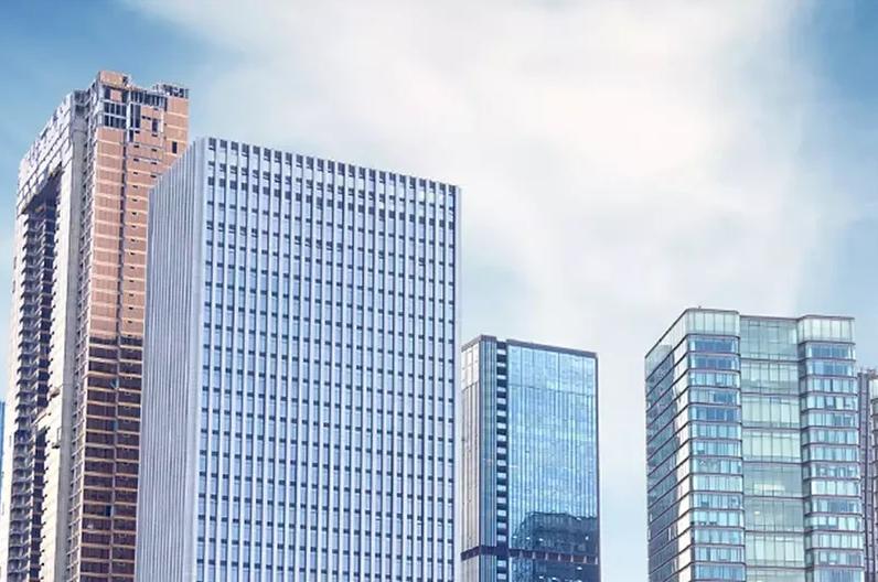 Skyscrapers against a bright blue sky.