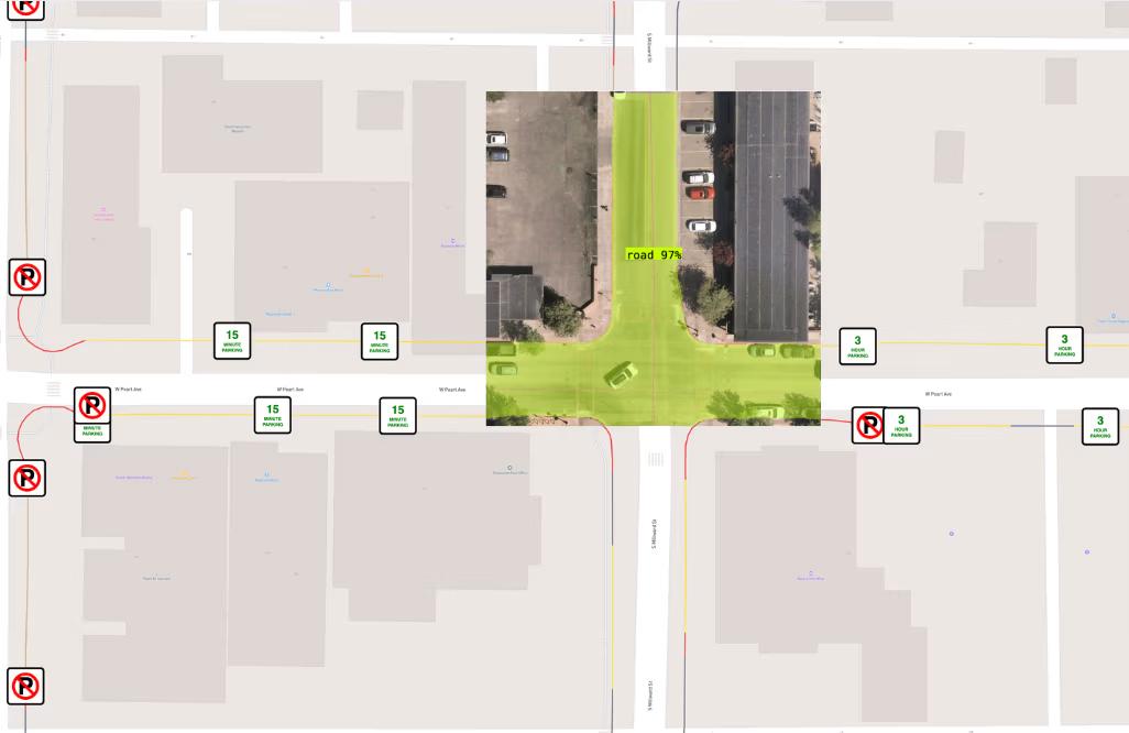 A city map marked with parking restriction icons along both sides of a street, overlaid with satellite imagery where a vision model has shaded the road surface.