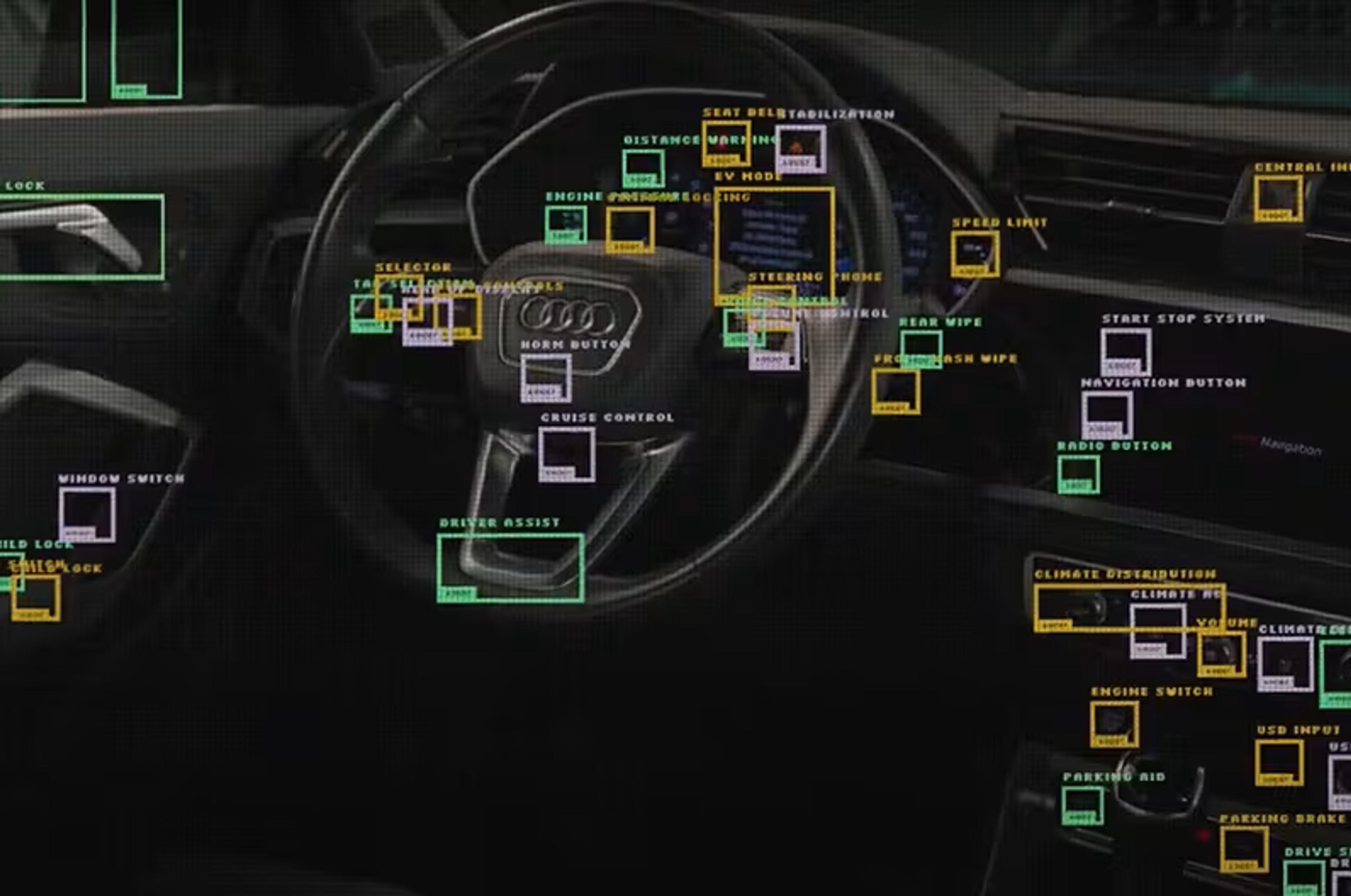 Car interior with object detection boxes and labels on dashboard, steering wheel, and door components.