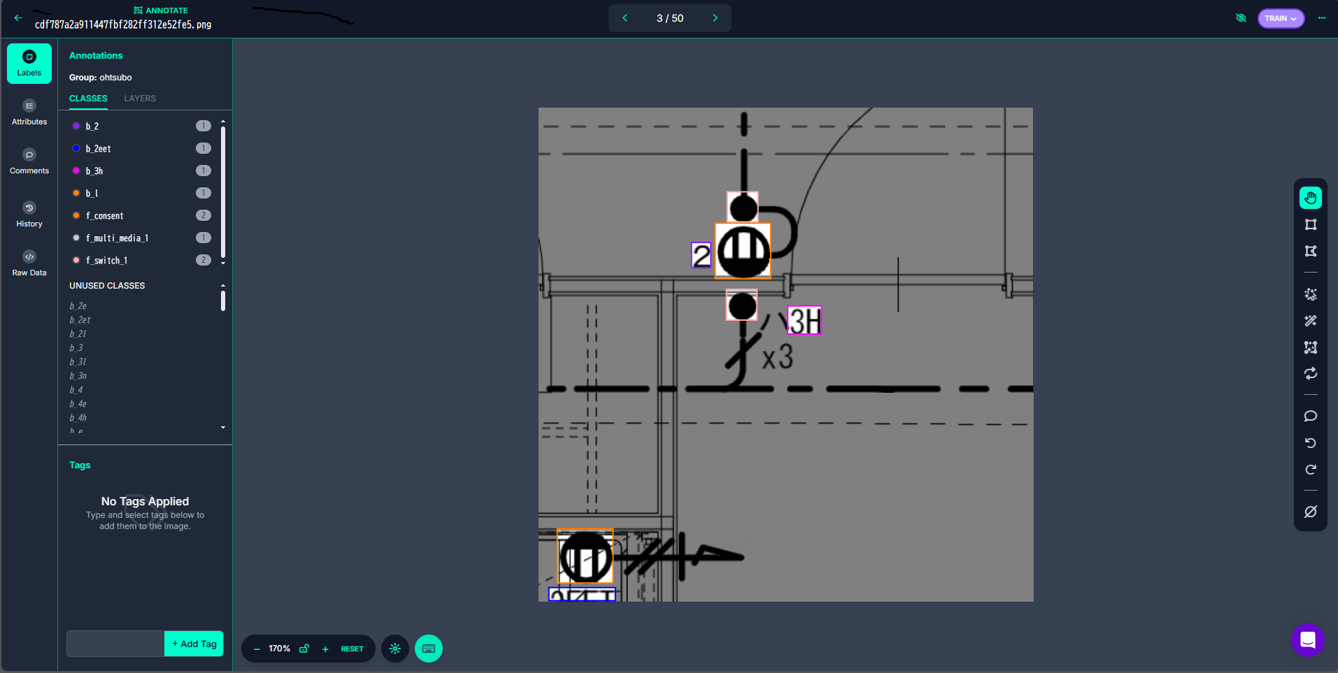 A CAD drawing open in the Roboflow annotation tool, electrical and fire safety symbols boxed on the plan and the class list of building components in the sidebar.