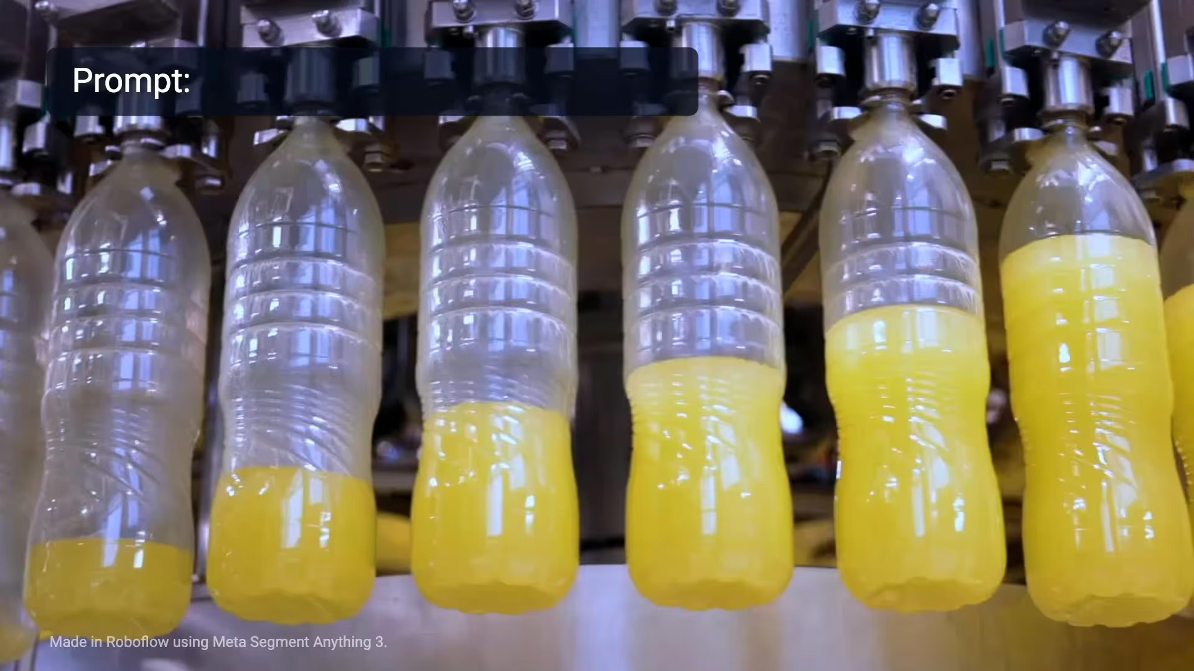 Juice bottles on a filling line, segmented with Meta Segment Anything 3 in Roboflow