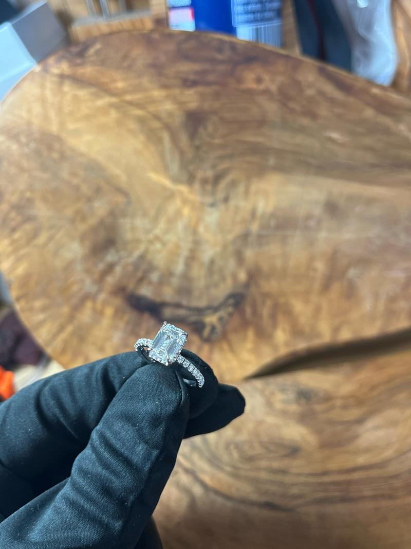 Emerald Cut Hidden Halo Engagement Ring with Pave Band