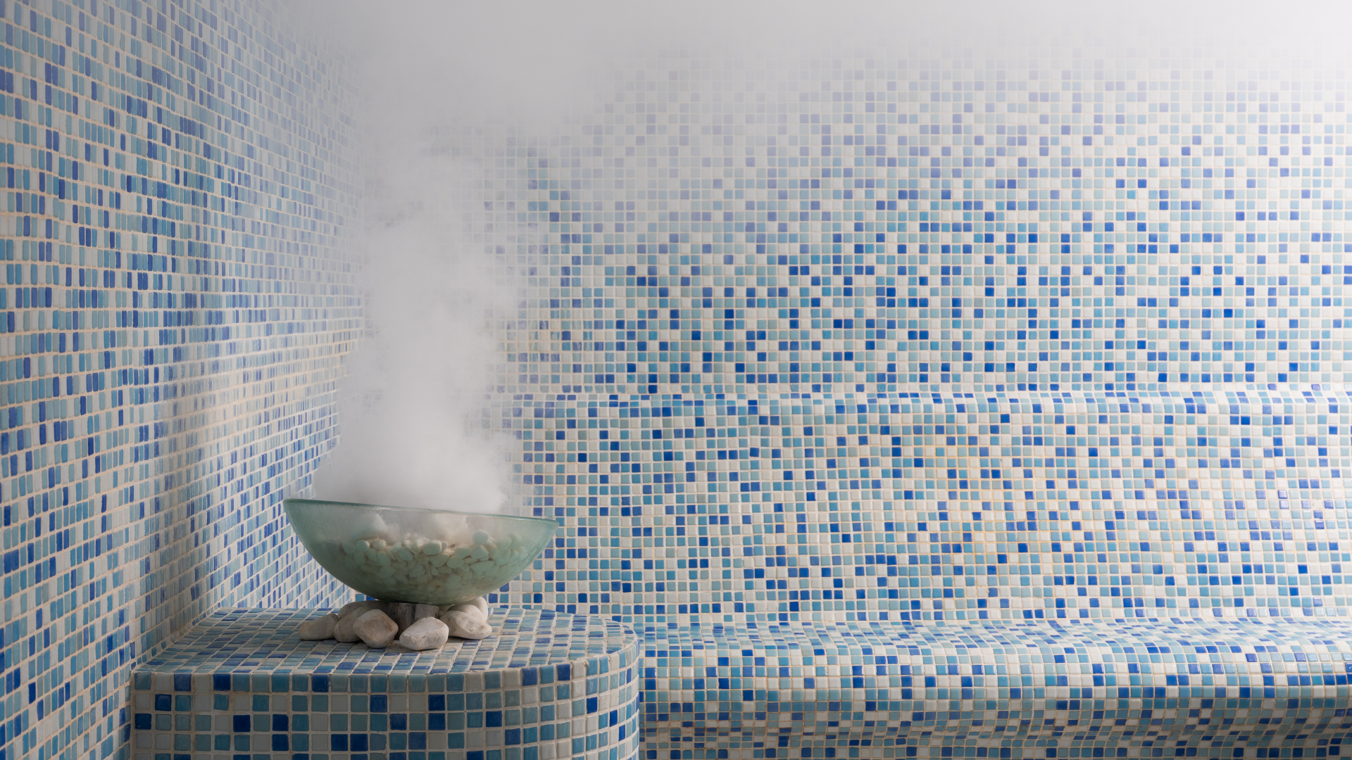 Steam filling up a sauna and steam room